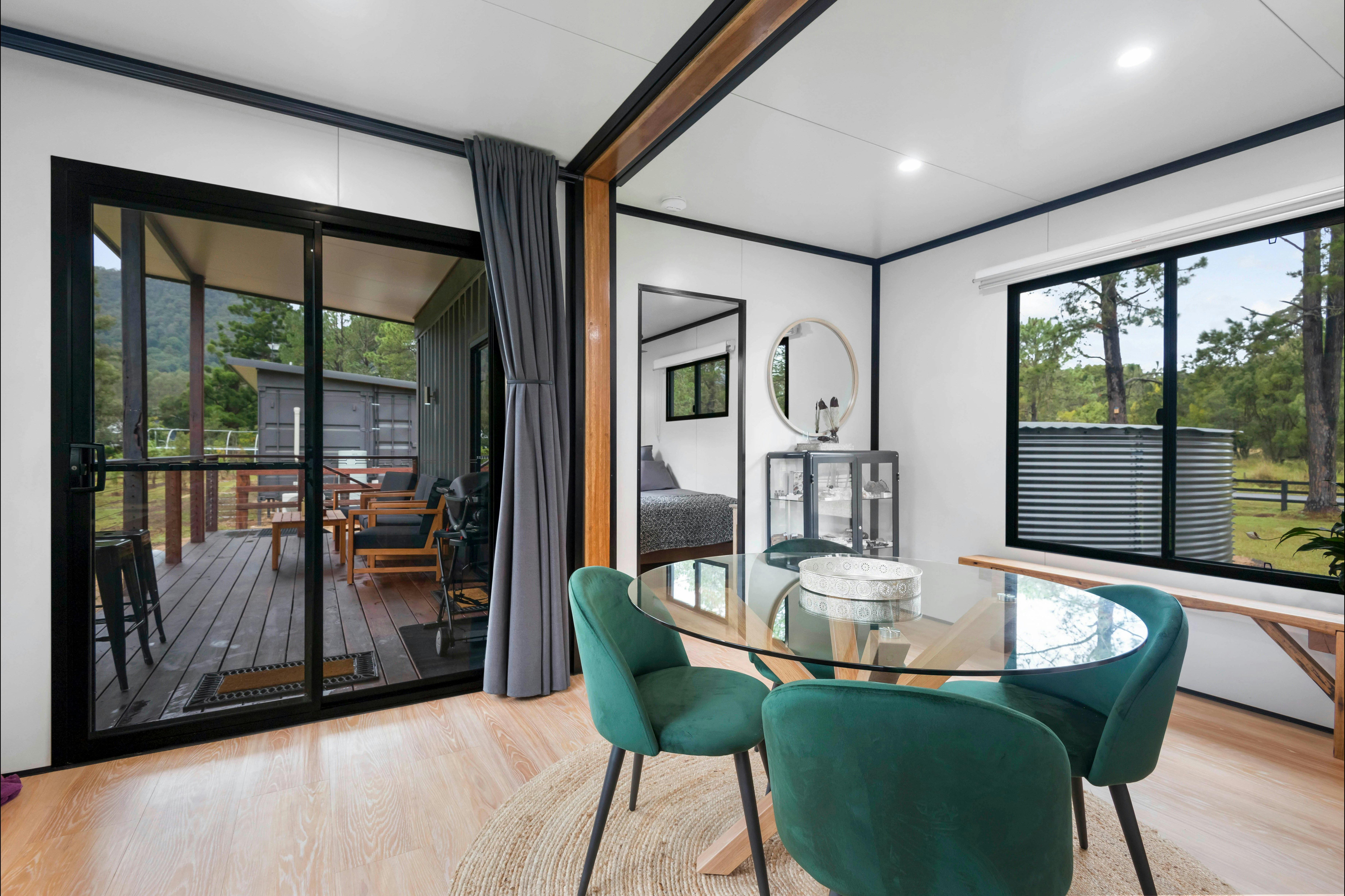 Internal shot showing the dining room looking out towards the hardwood deck