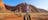 A group zips past the camera as they Segway the most scenic section of Uluru