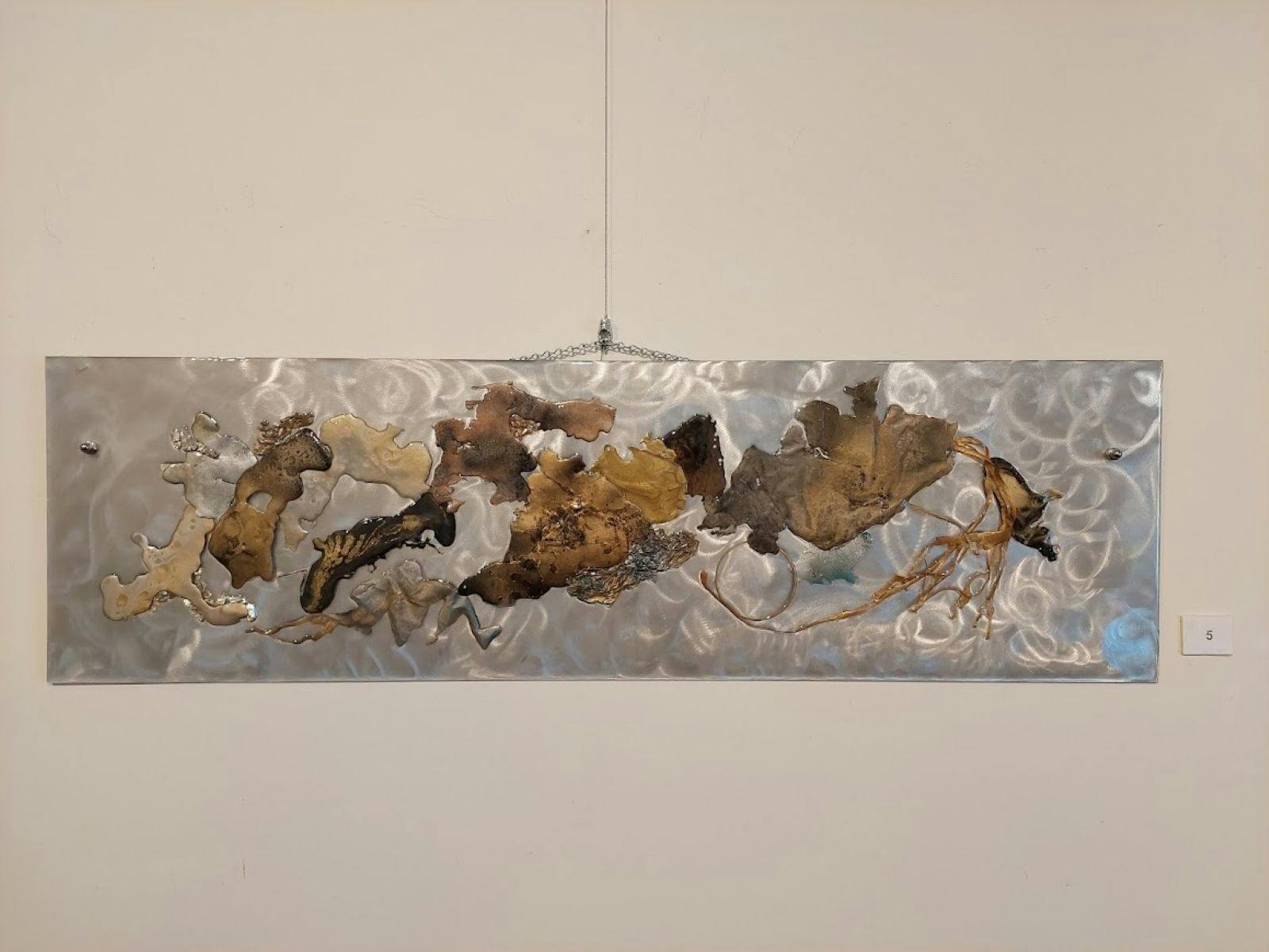 Resin artwork in silver and earthy tones