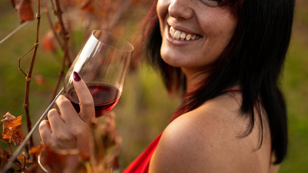 Enjoying a glass of Barbera in the vineyard