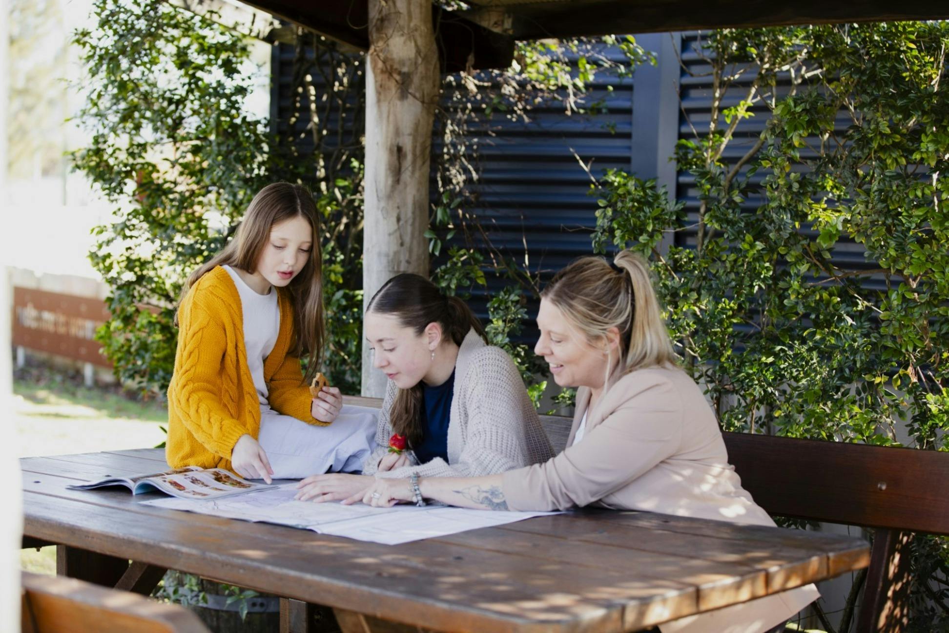 Visitors at picnic tables