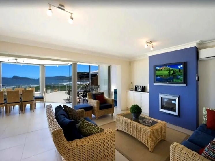 enjoy the uninterrupted ocean views from the spacious open-plan living space