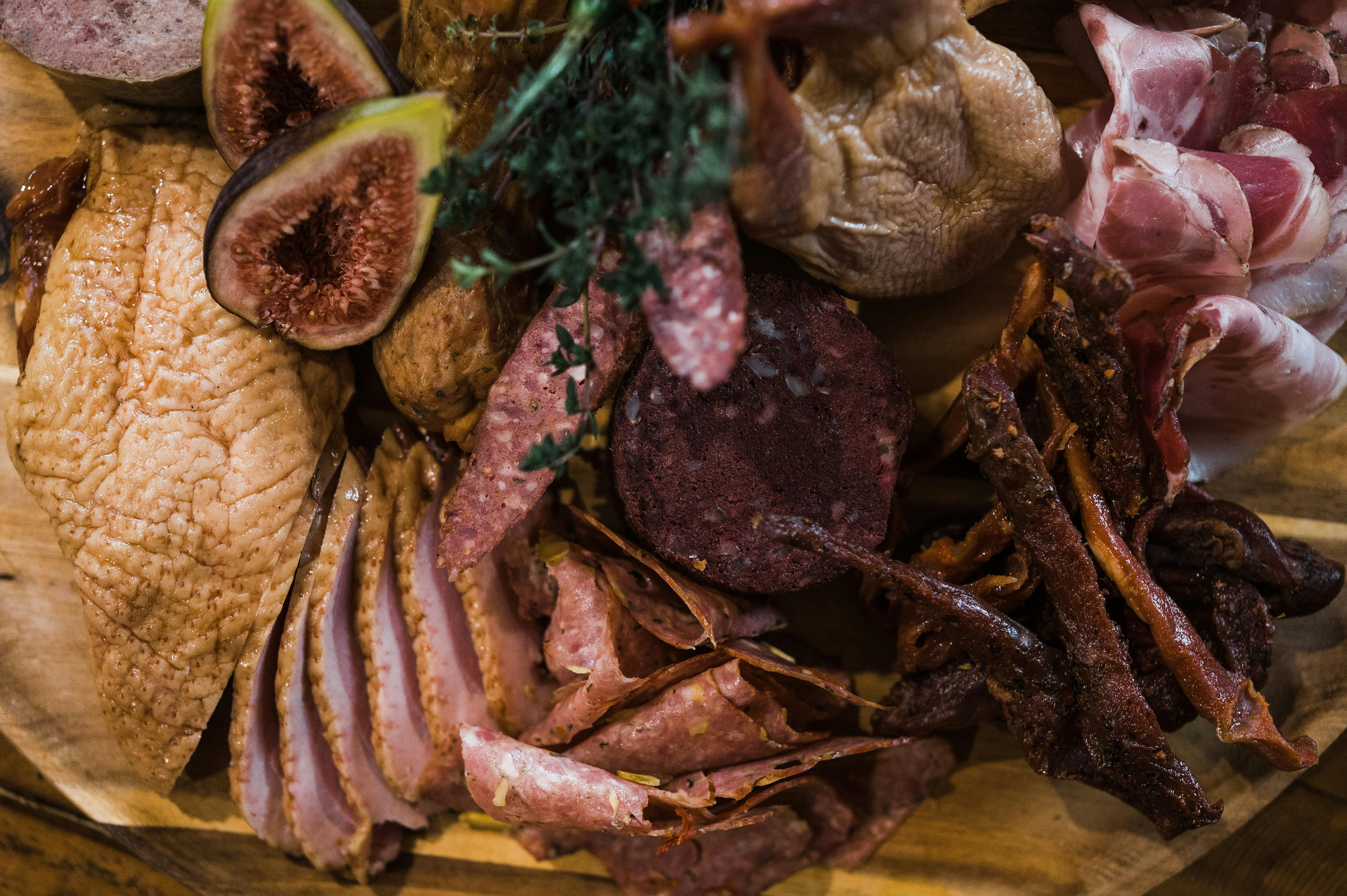 Image shows platter of gourmet smallgoods meats