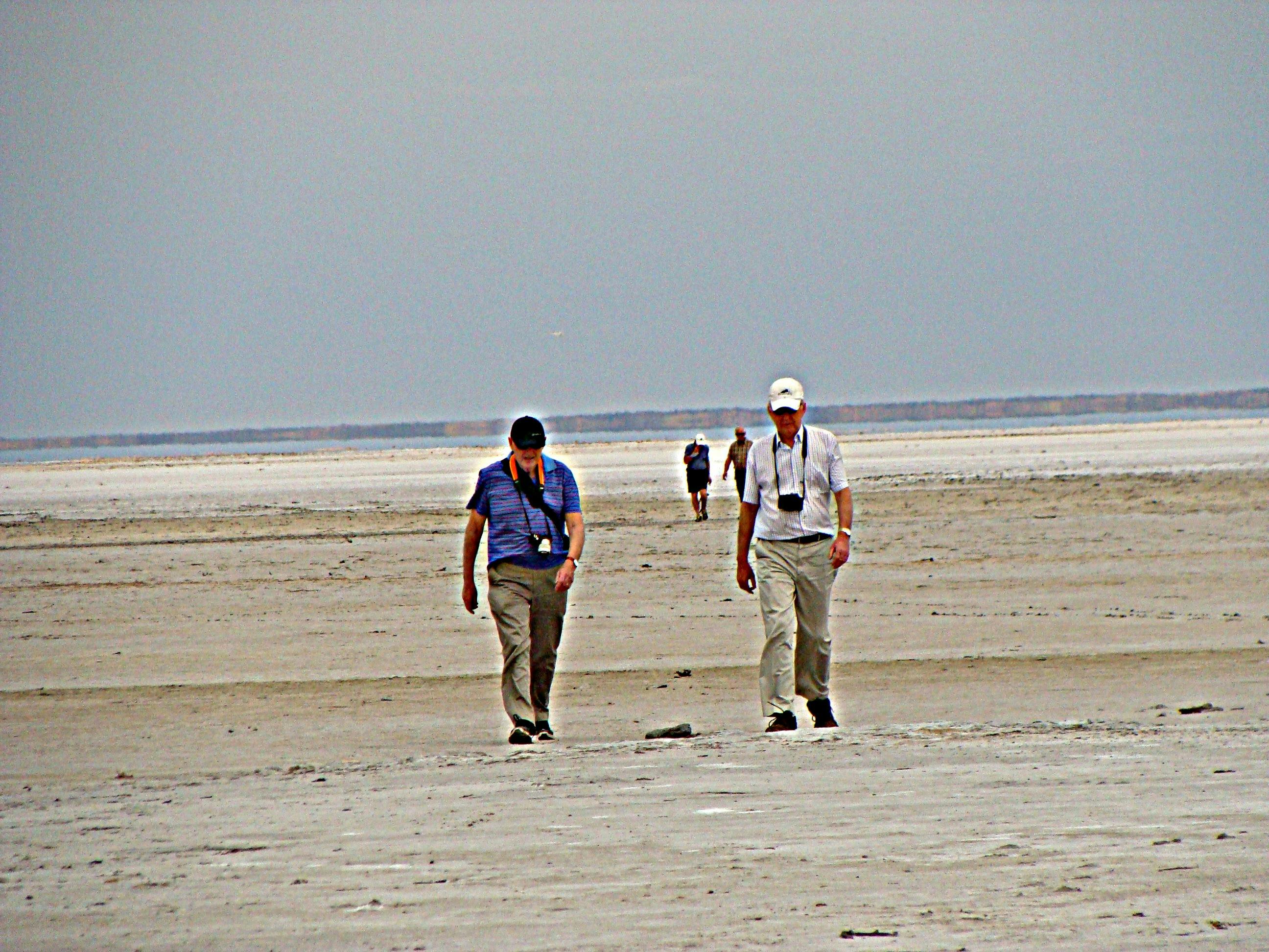 Guest walking on the salt lake at Lake Eyre