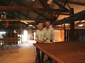 Owners Pete and Margie in shearing shed
