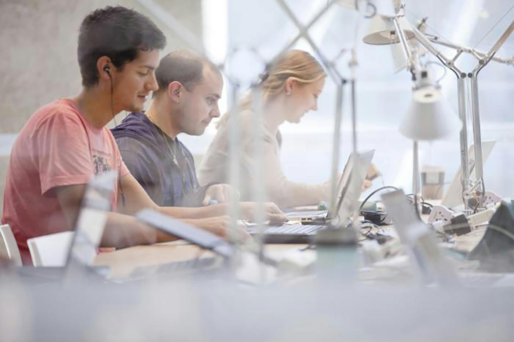People studying in a modern library