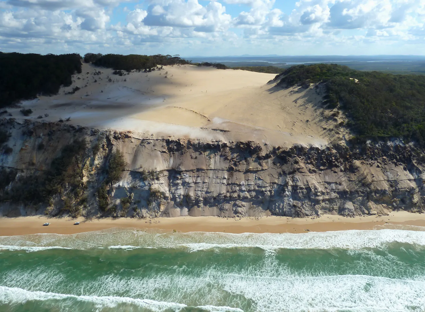 View the awesome sites of Carlo Sand Blow 35 hectares of sand swept paradise amongst thick follage