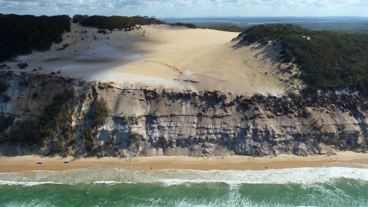 View the awesome sites of Carlo Sand Blow 35 hectares of sand swept paradise amongst thick follage