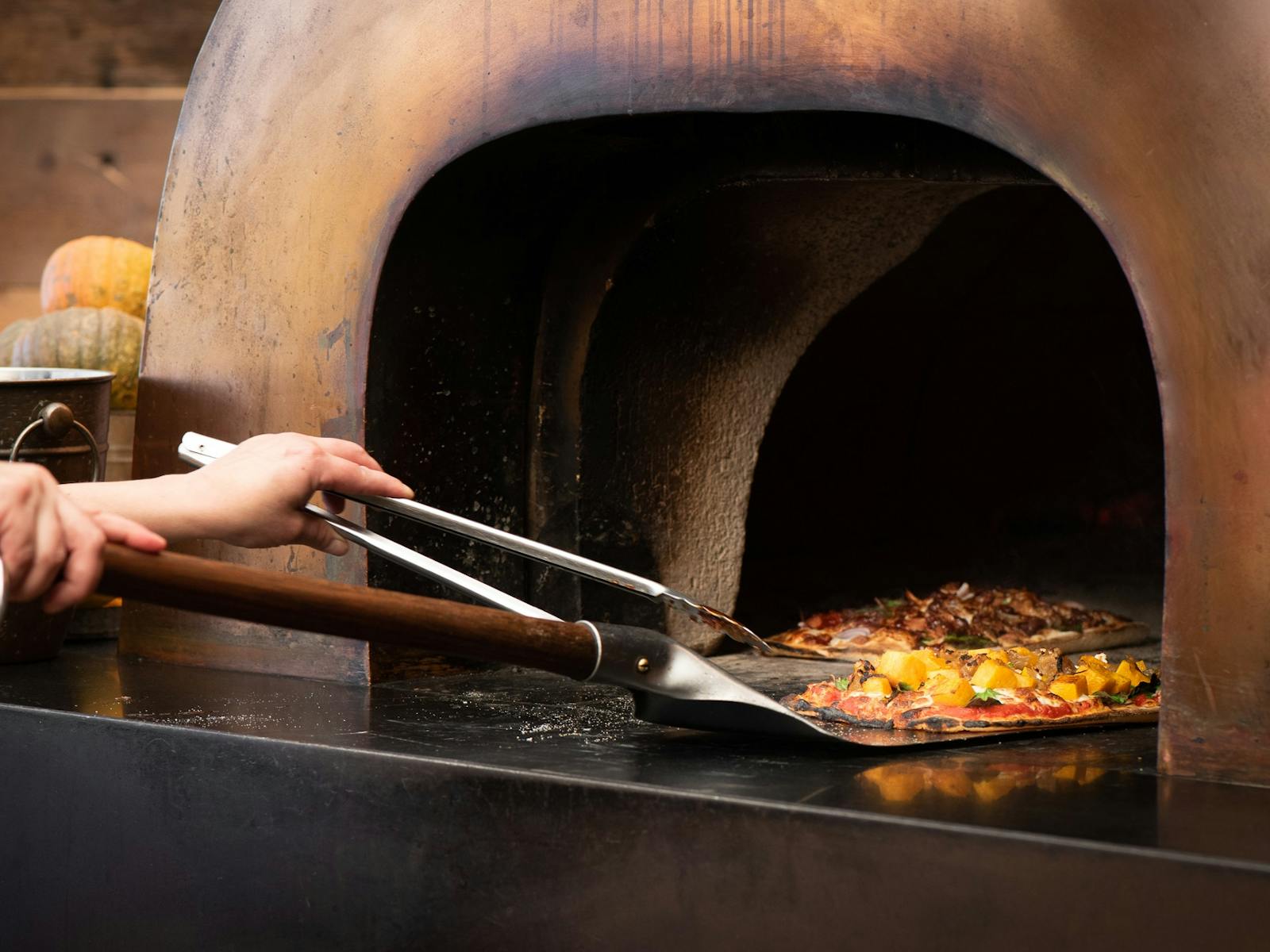 Our famous wood fired pizzas are available on our menu