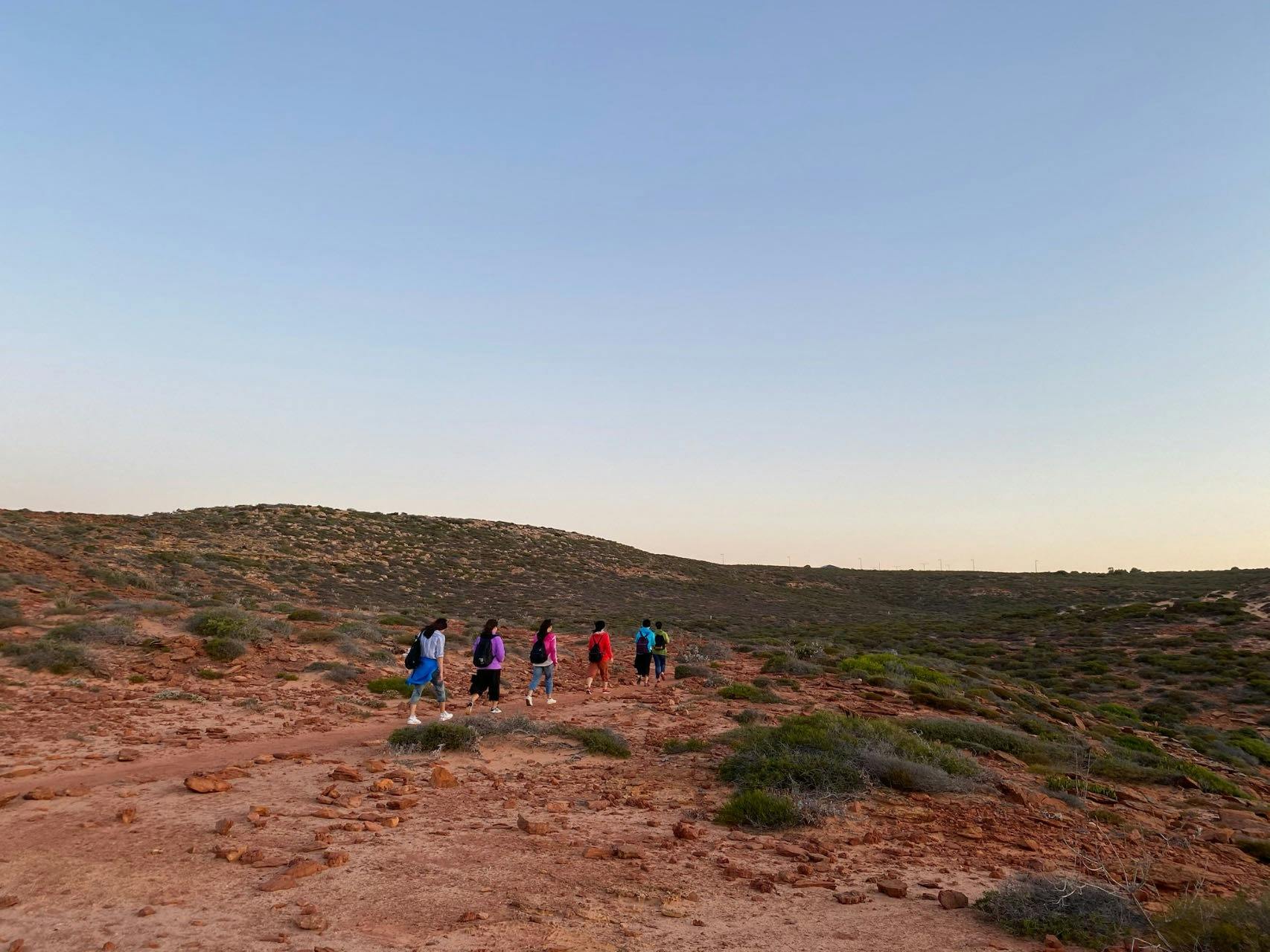 guests walking on rocks
