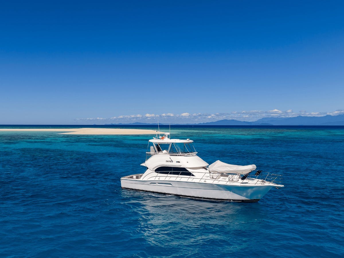Allure Private Charter at sand cay in the great barrier reef