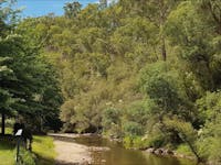 Standard Riverfront Cabin Outside Sitting Jamieson Caravan Park Victoria Australia Camping