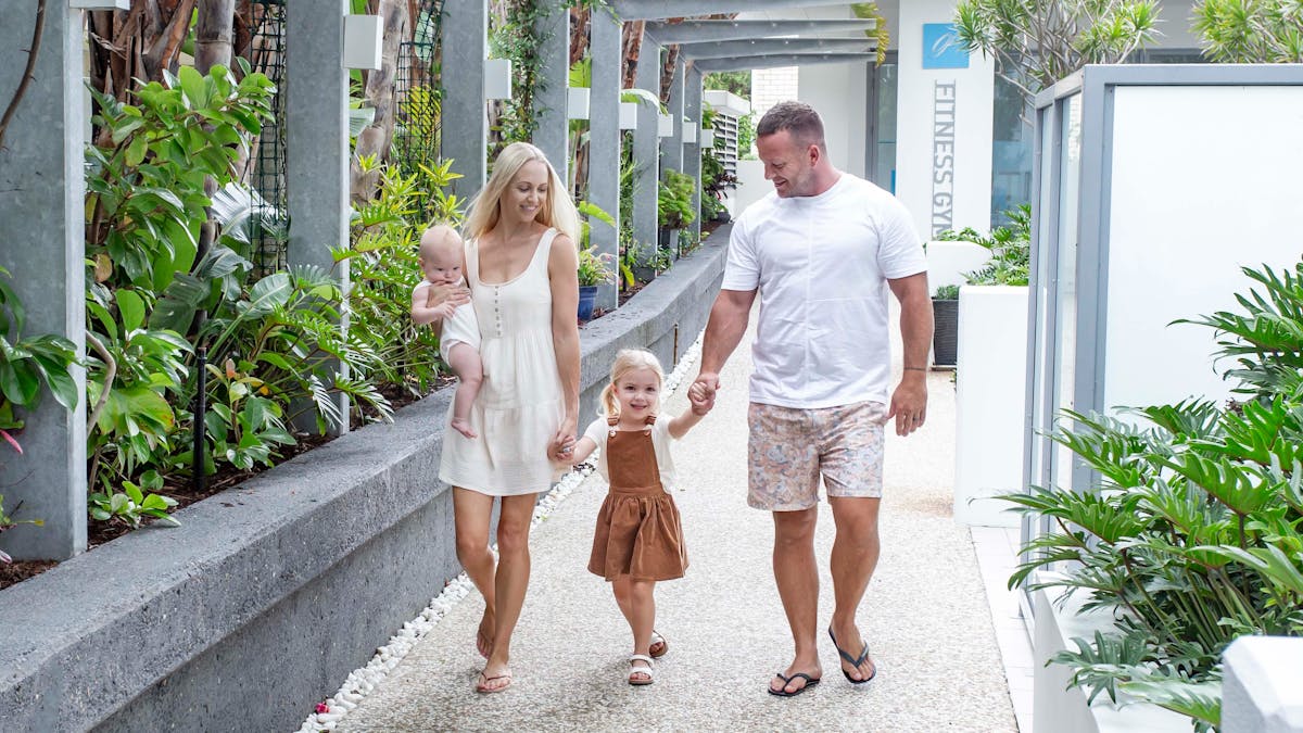 Family walking through the gardens
