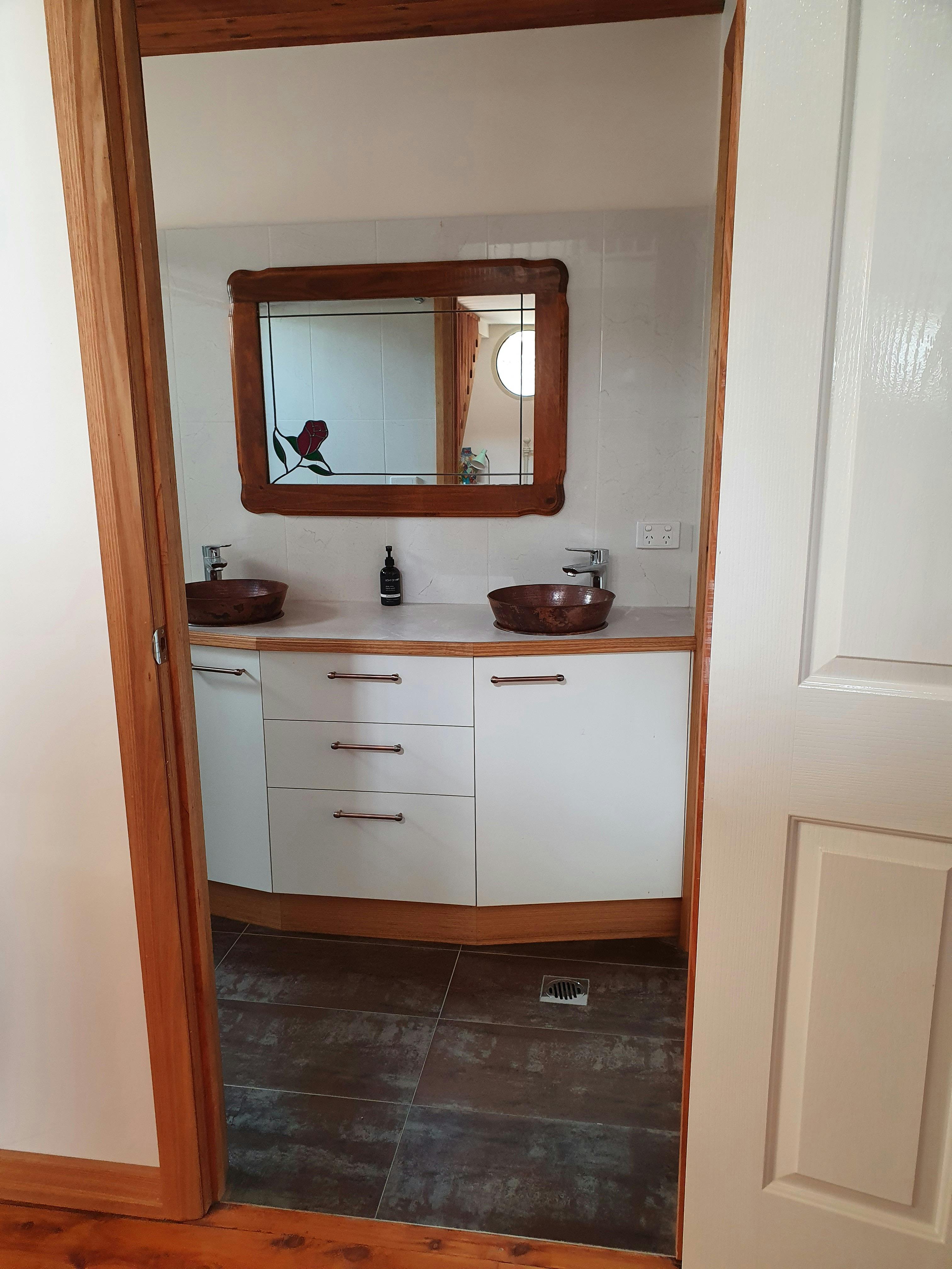 Bathroom has two beautiful bowls. All sheets and linen provided.