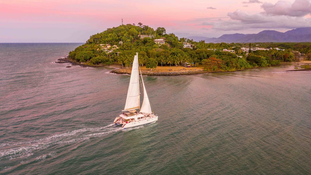 Sunset Sailing over the coral sea s returning to Port Douglas and views over the Rex Smeal park