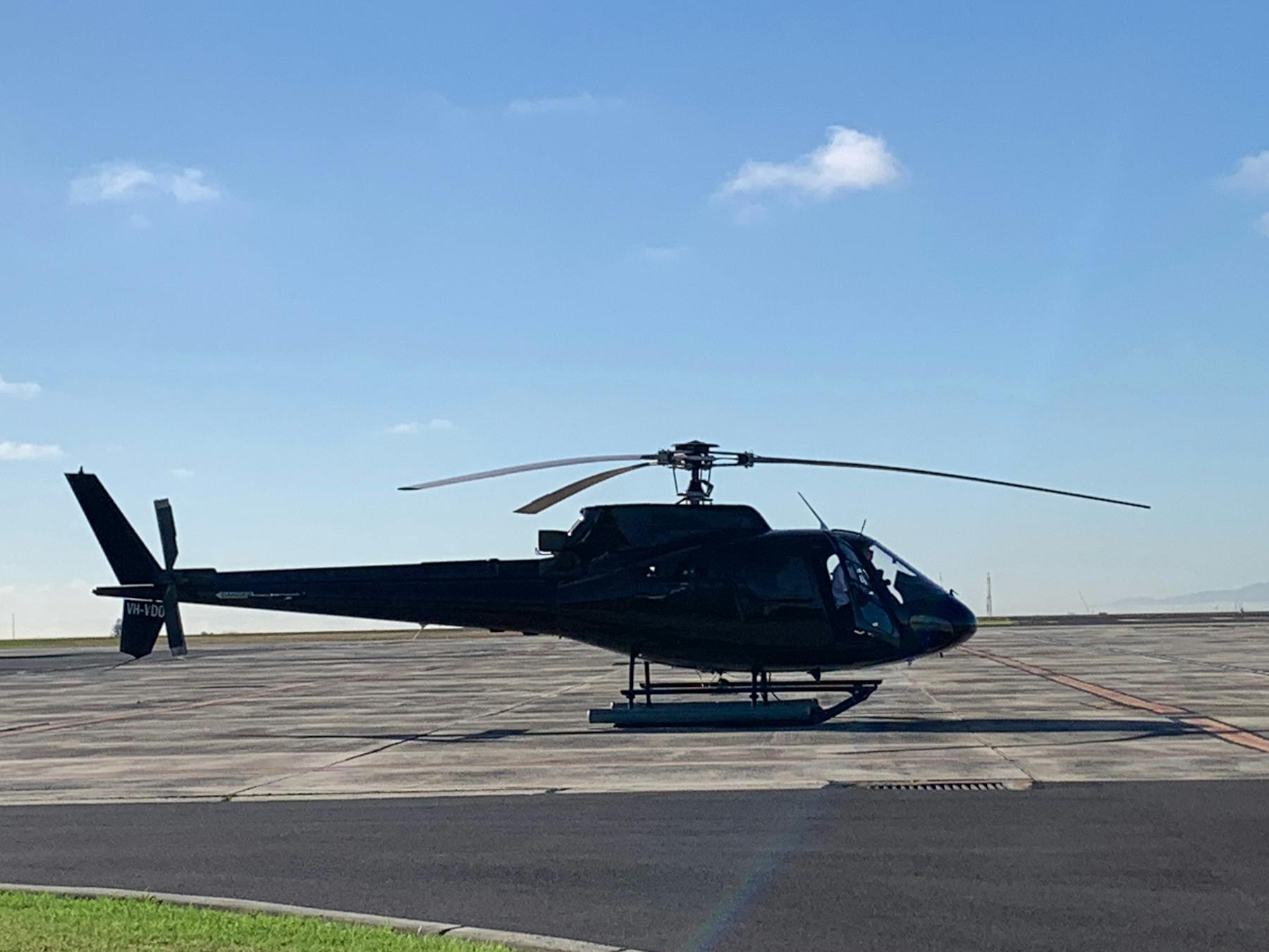 Black Helicopter on a helipad in Melbourne