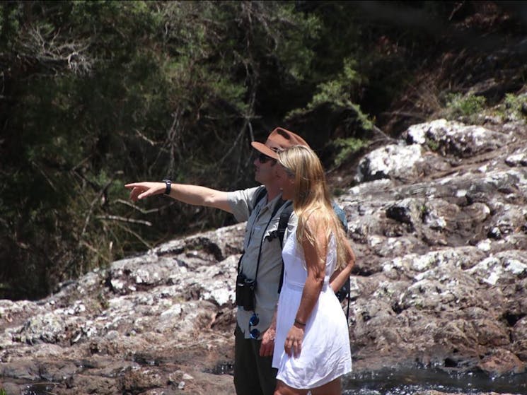 Rainforest tour guide with a guest