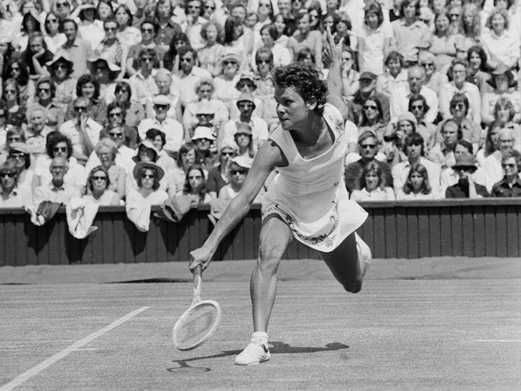 A black and white photo of Wiradjuri tennis legend Evonne Goolagong Cawley.