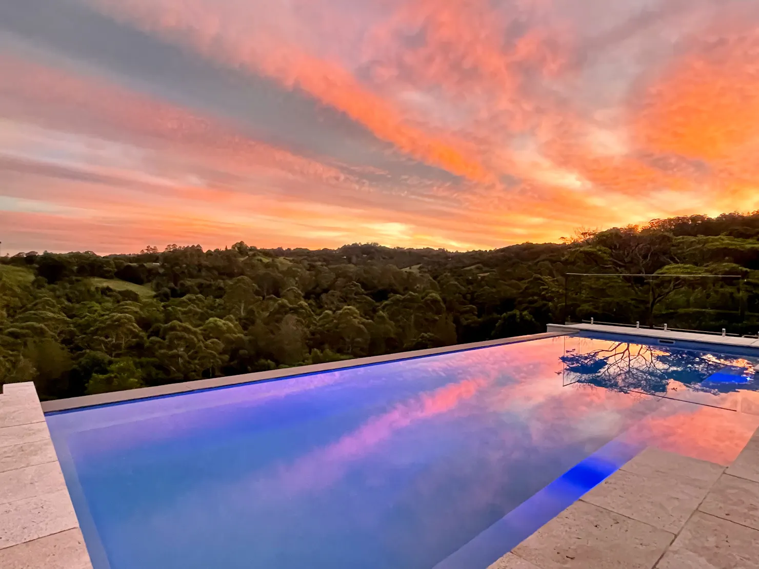 Sunset reflecting on the Infinity Edge Pool