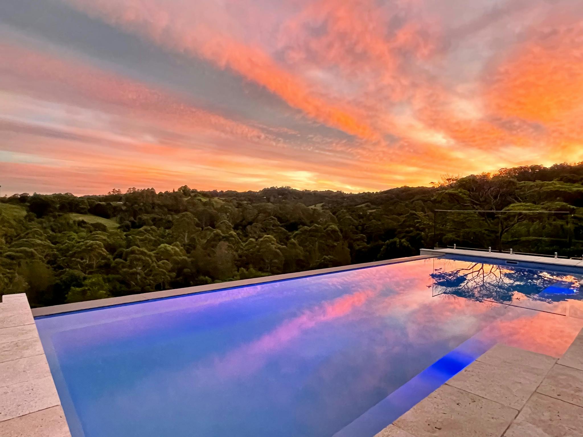 Sunset reflecting on the Infinity Edge Pool Sunset reflecting on the Infinity Edge Pool
