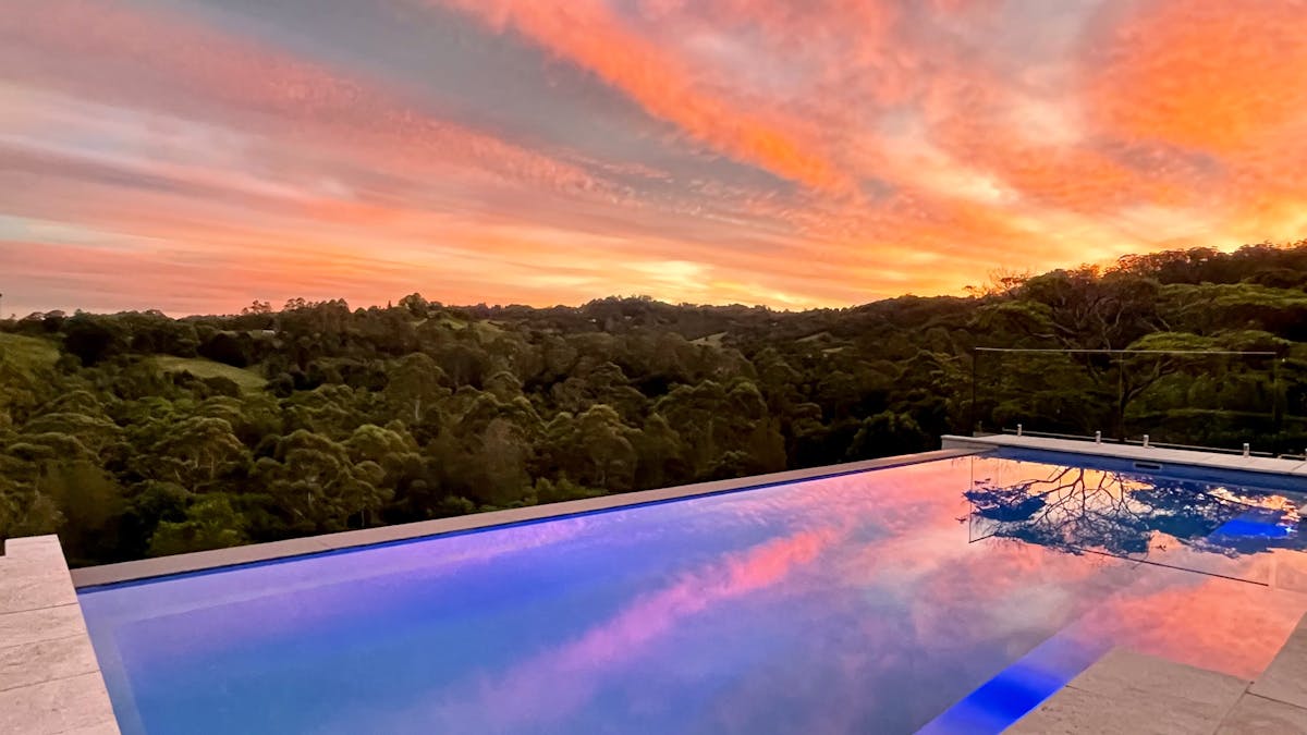 Sunset reflecting on the Infinity Edge Pool