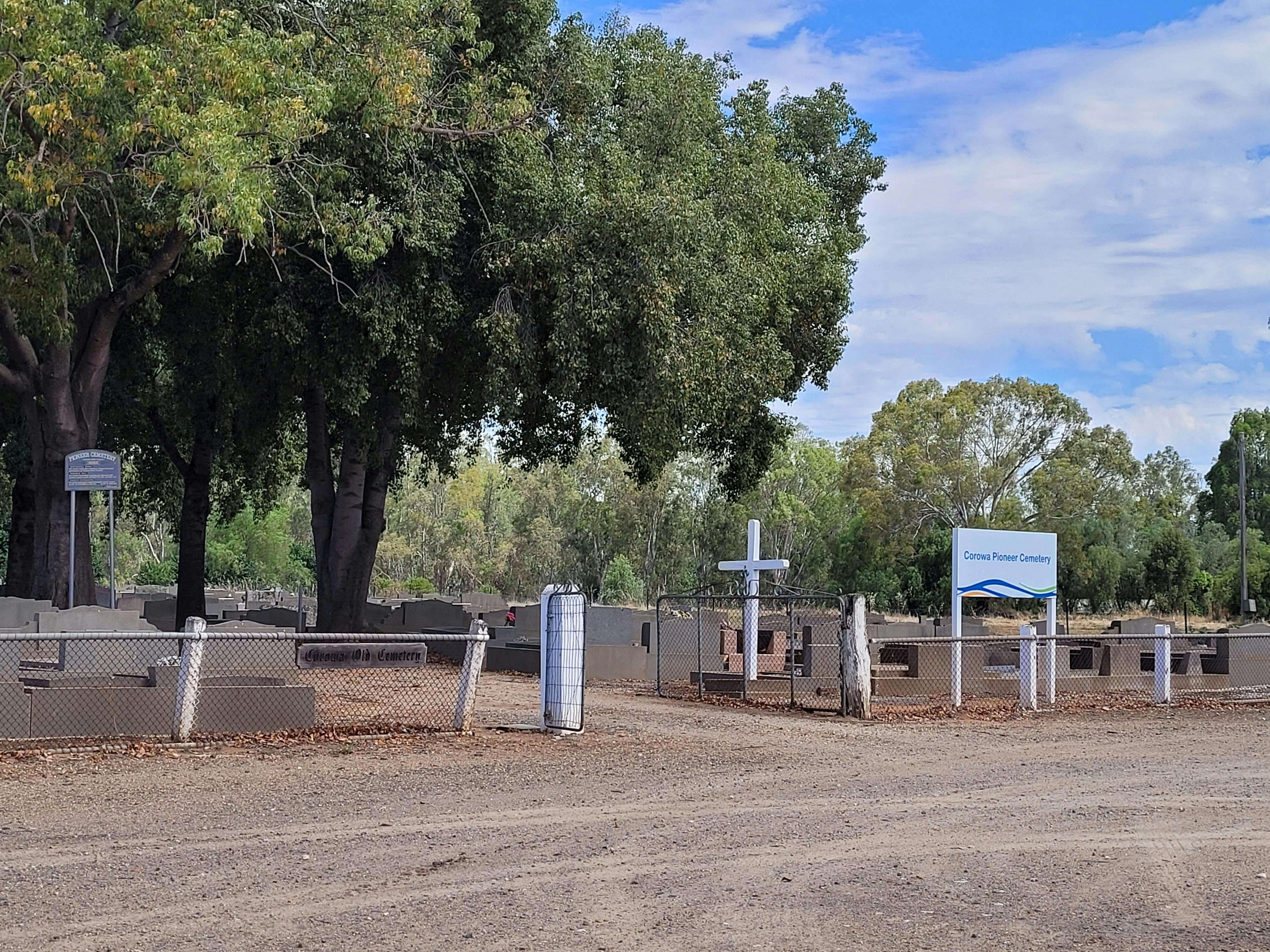 The entrance to Corowa's Pioneer Cemetery. The cemetery is shaded with large trees.