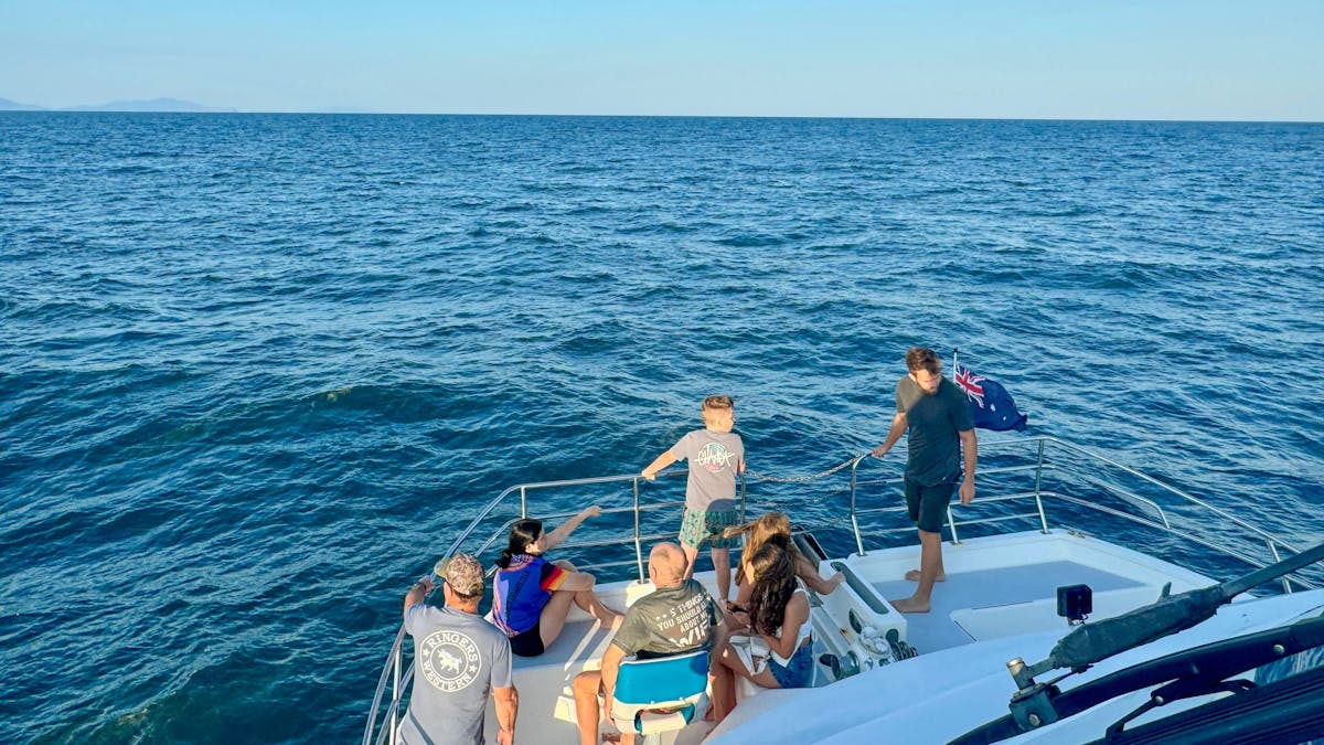 passengers enjoying the views from the front deck