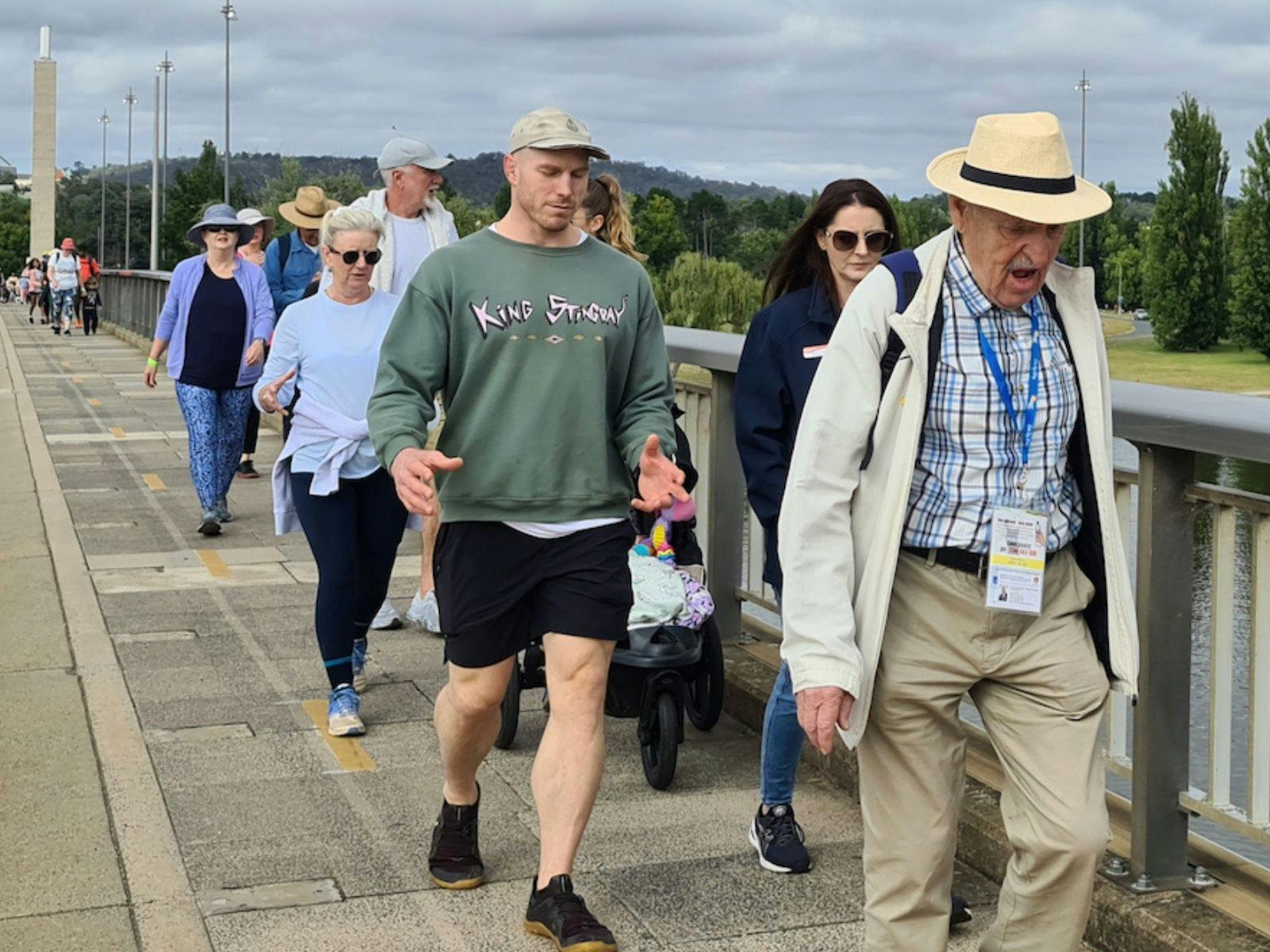 a group of people of various ages walking