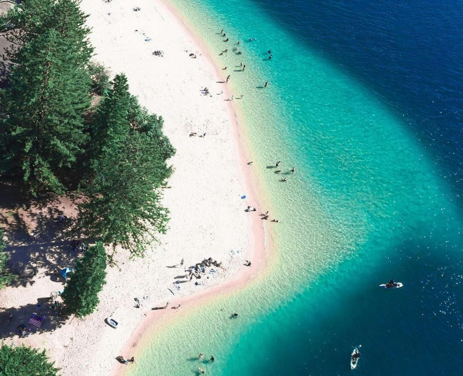 Aerial overlooking beachgoers at Clontarf Reserve, Clontarf