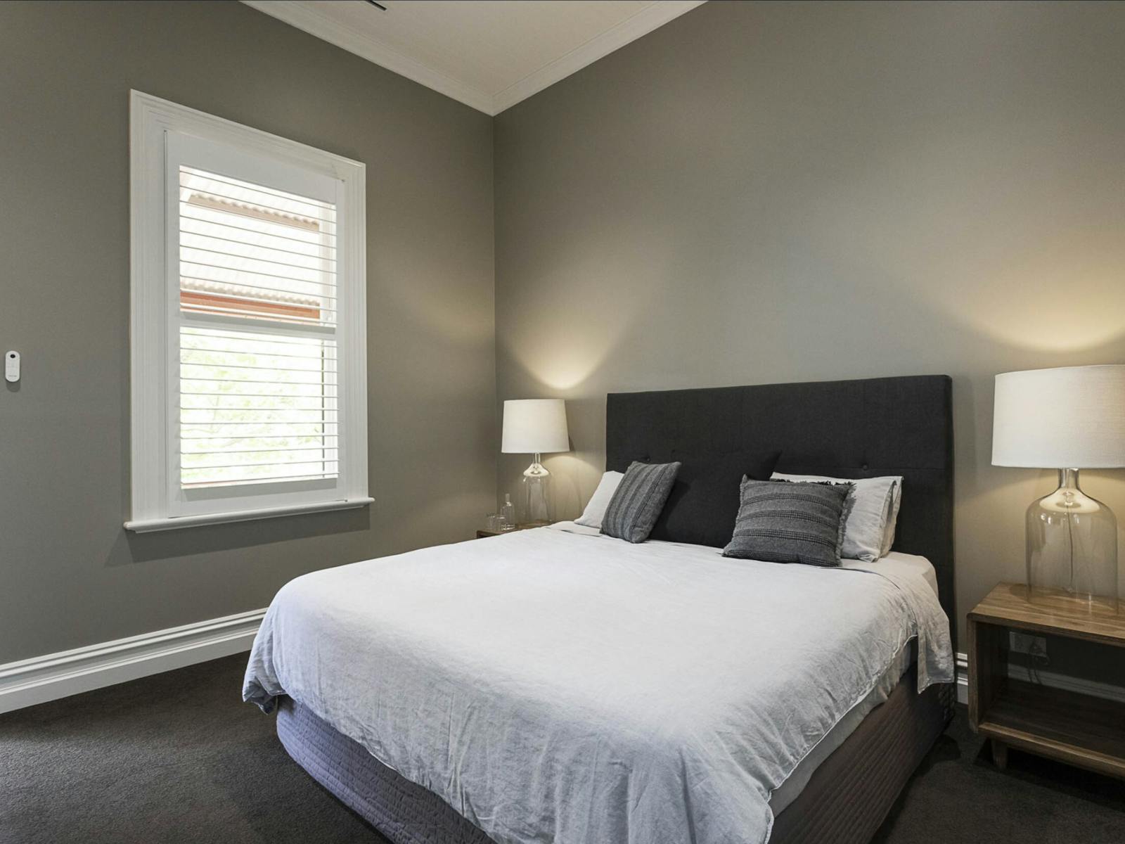 bedroom, side table and table lamps at The Brewer's House