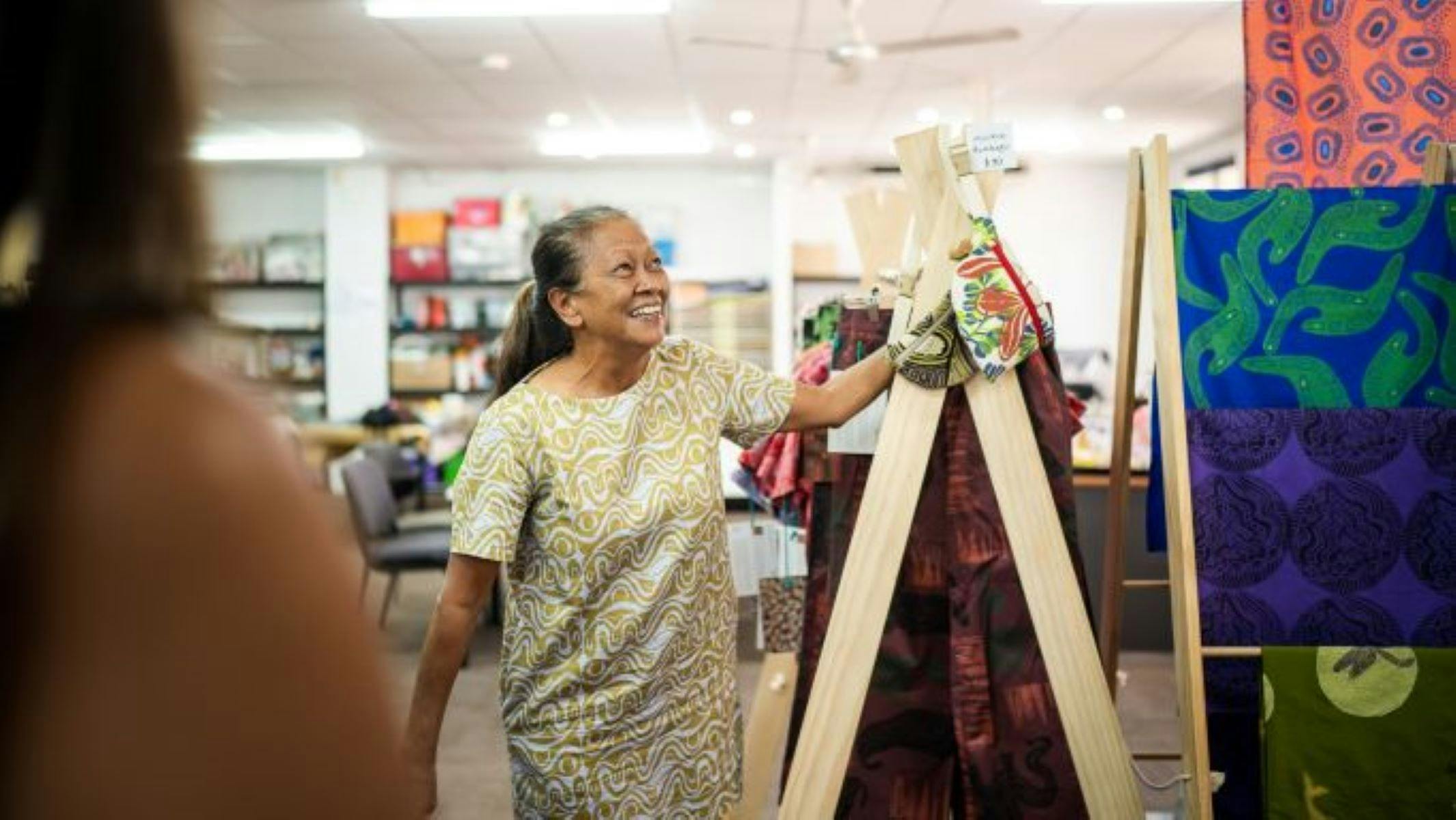 Local artist showcasing Indigenous crafts at Ngarlu Jarndu during the Broome and Around Treasures of