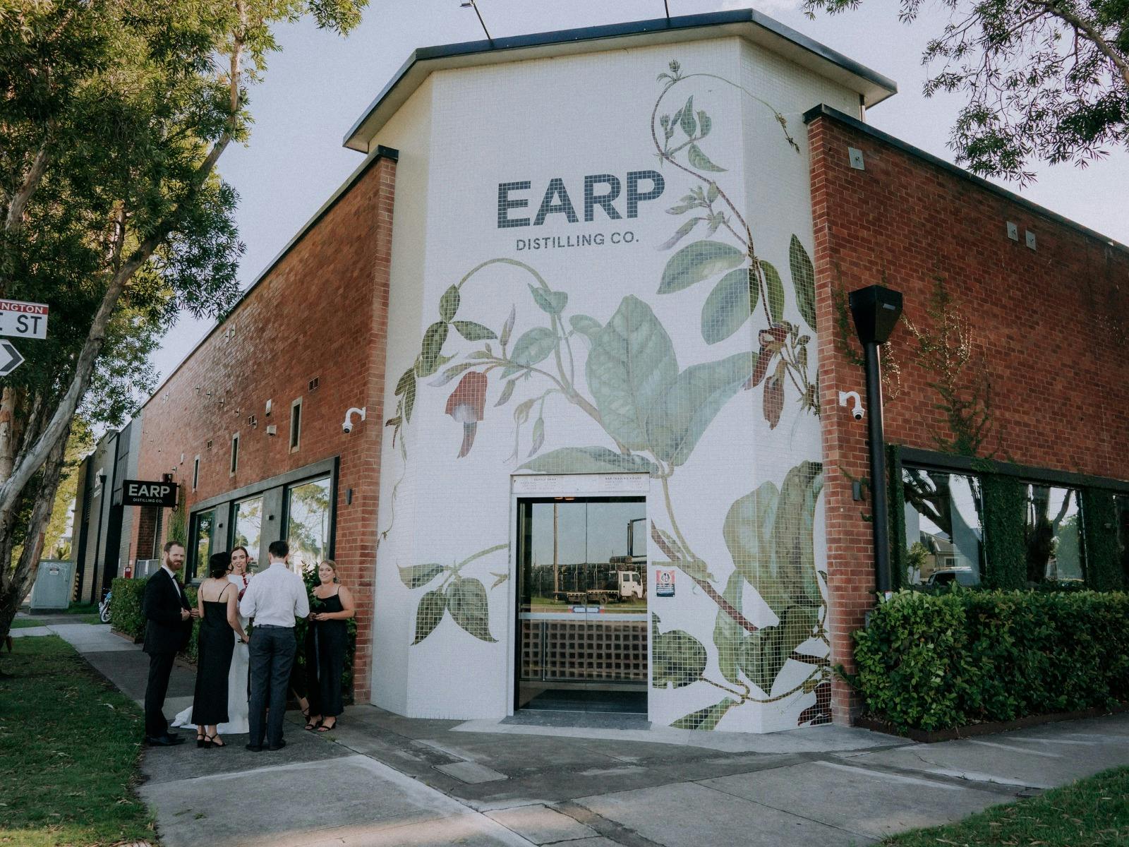 The entrance is adorned with beautiful mosaic tiles, creating a vibrant and intricate pattern