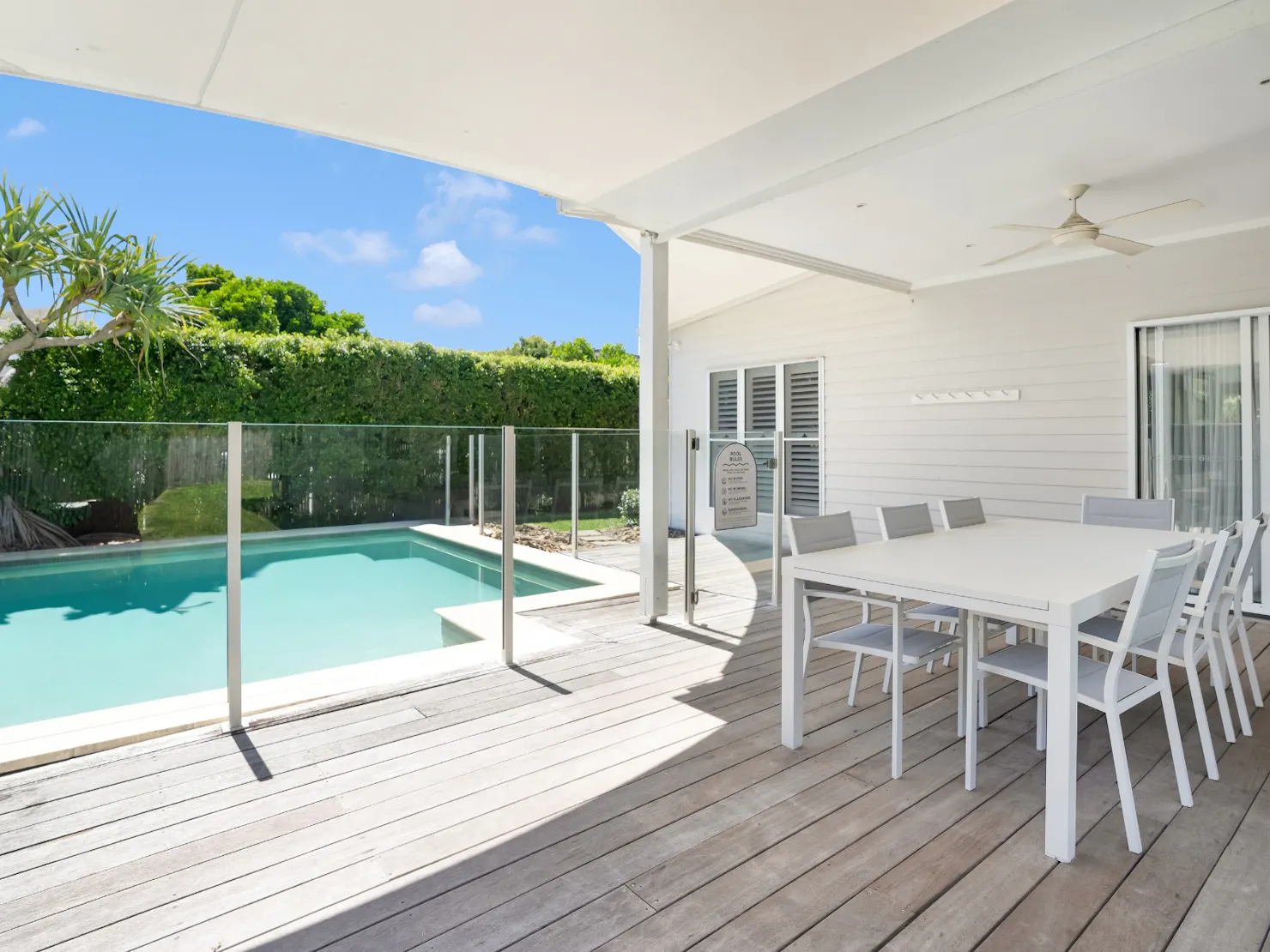 Balcony with outdoor dining, BBQ and pool area