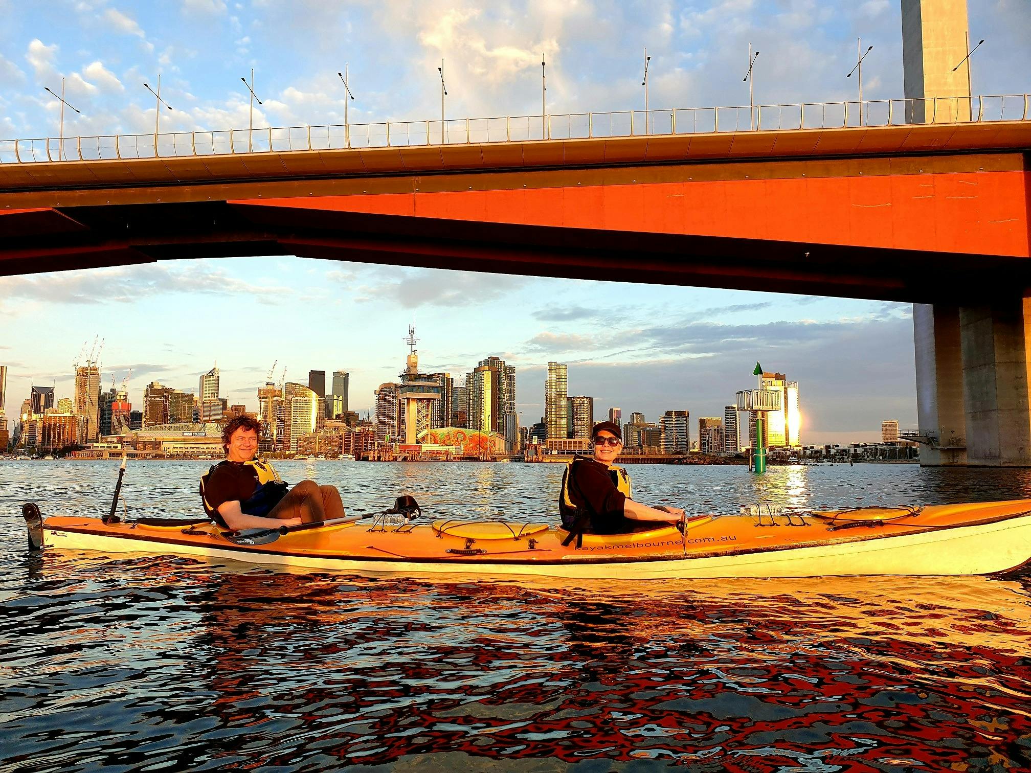 Kayakers in foreground, with the Bolte Bridge behind them