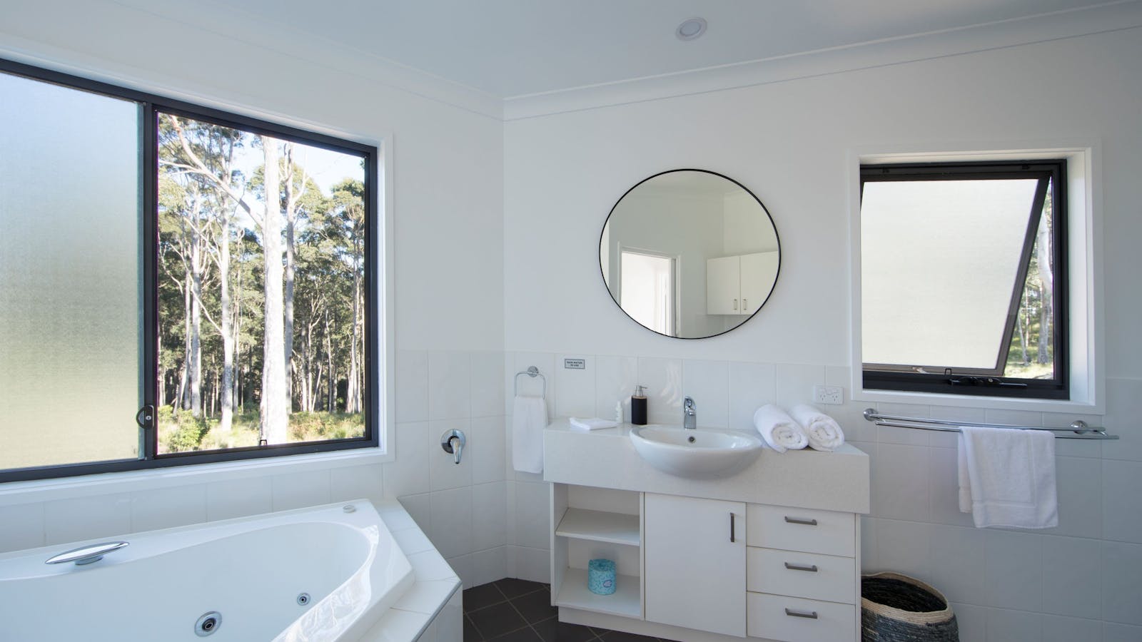 Modern bathroom with private, peaceful views