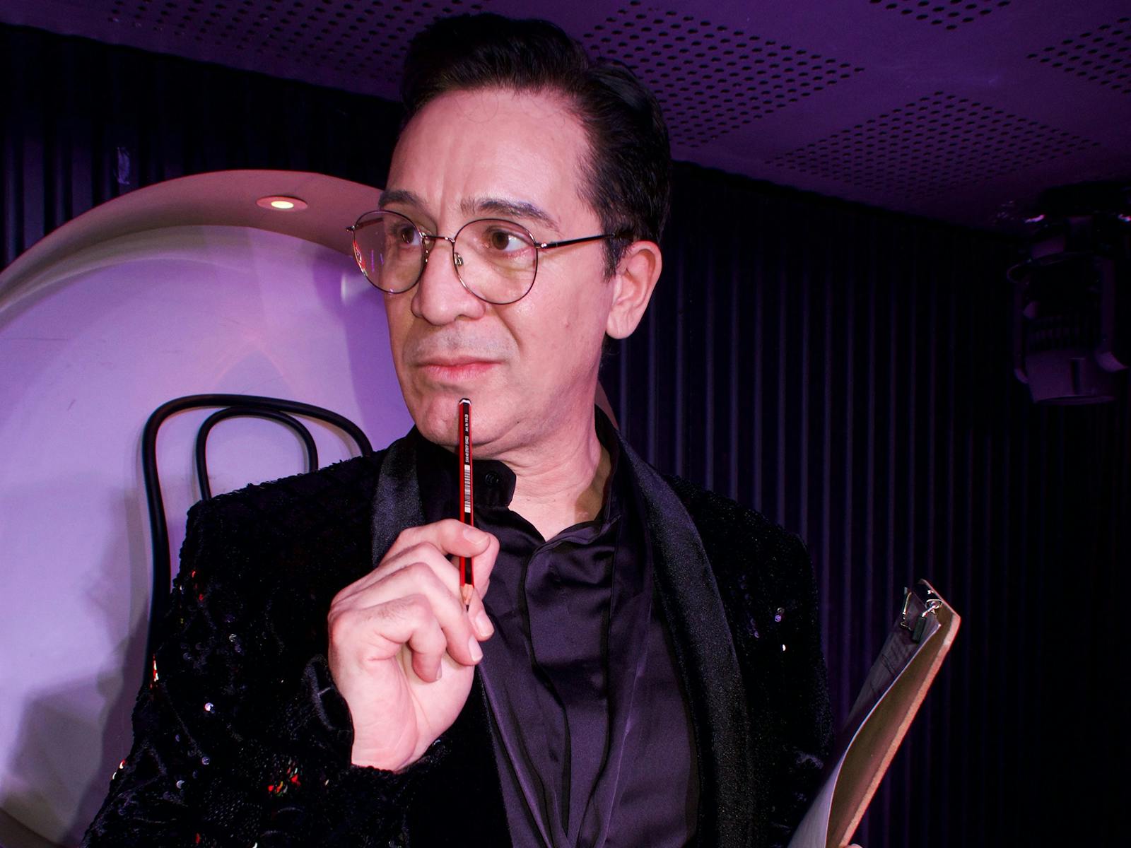 Handsome man with glasses in theatre bar