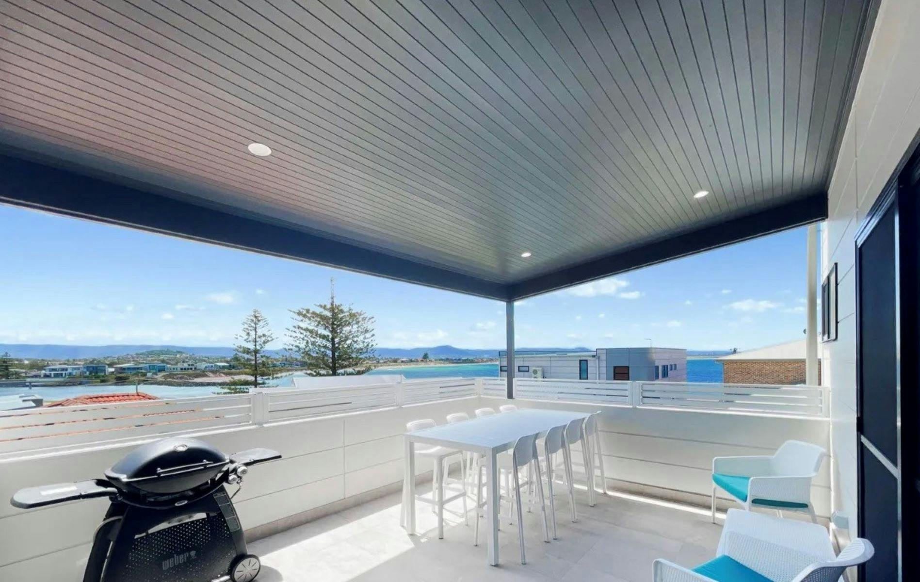 Outdoor entertaining on the veranda at Beach Side Luxury at the Point, Barrack Point, Shellharbour