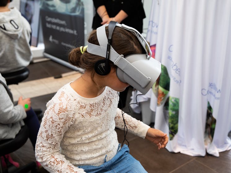 Child wearing a Virtual Reality headset