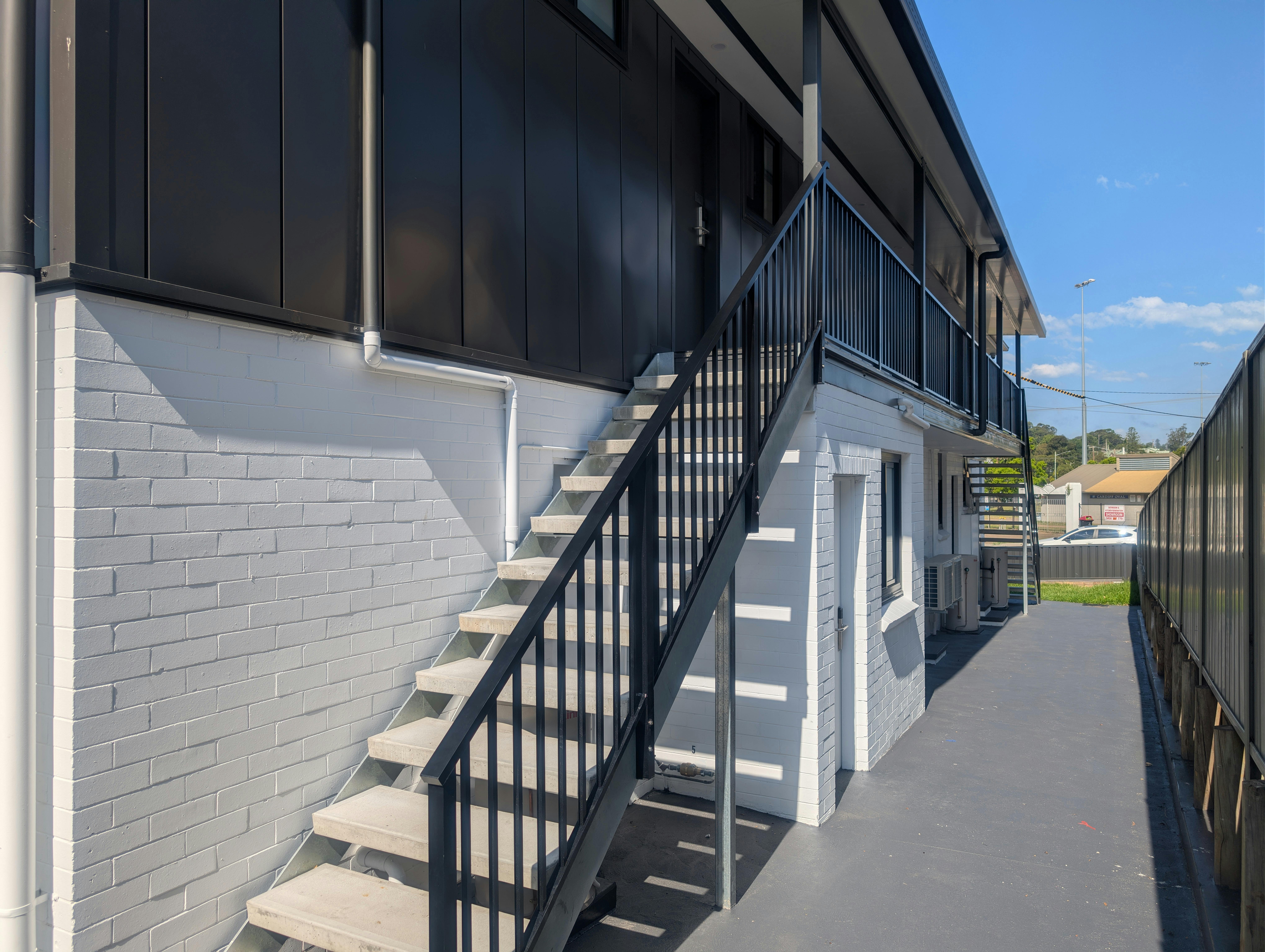 The Stairs at the rear of the building used to access the One Bedroom with Balcony Apartments.