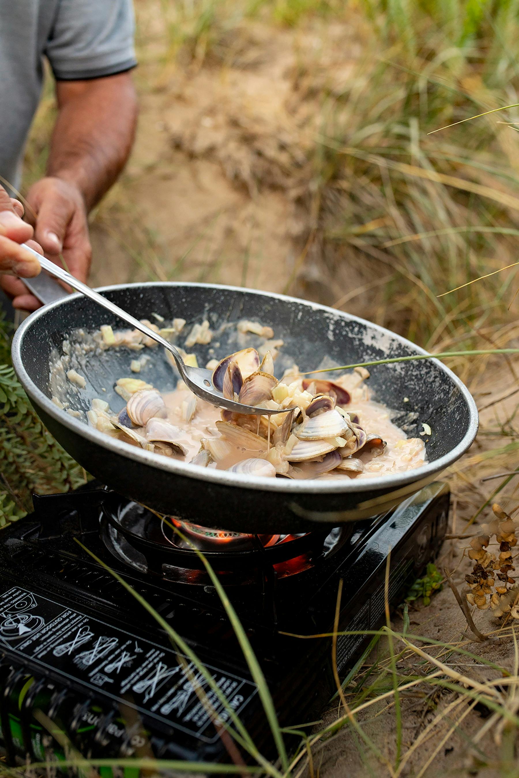 cooking pipi in the dunes
