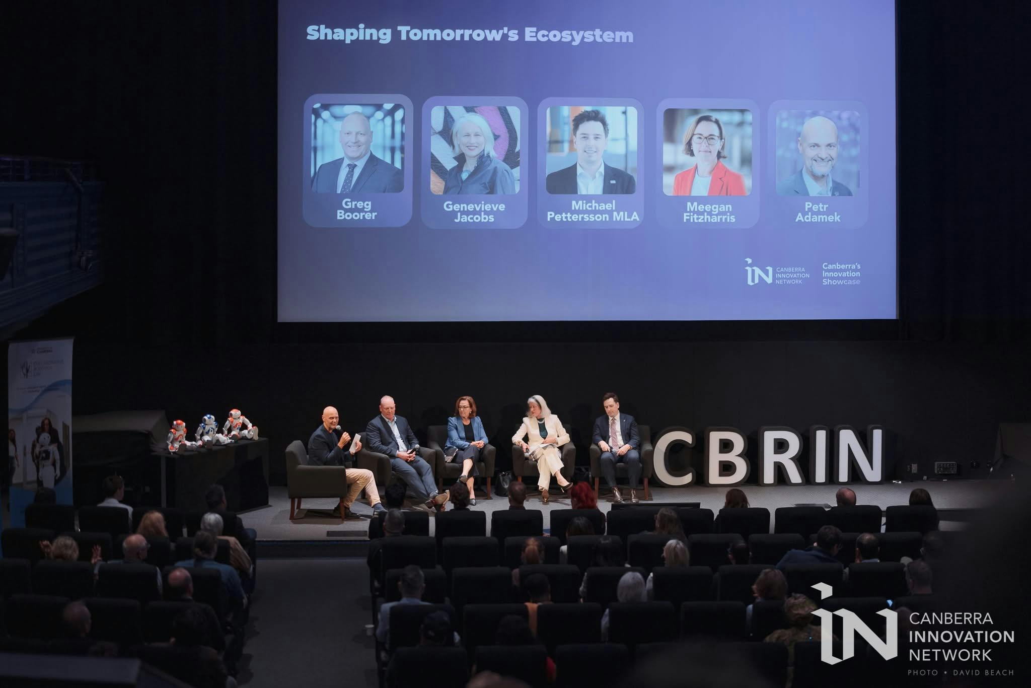 Photo of 5 speakers at the final panel at Innovation Showcase 2025