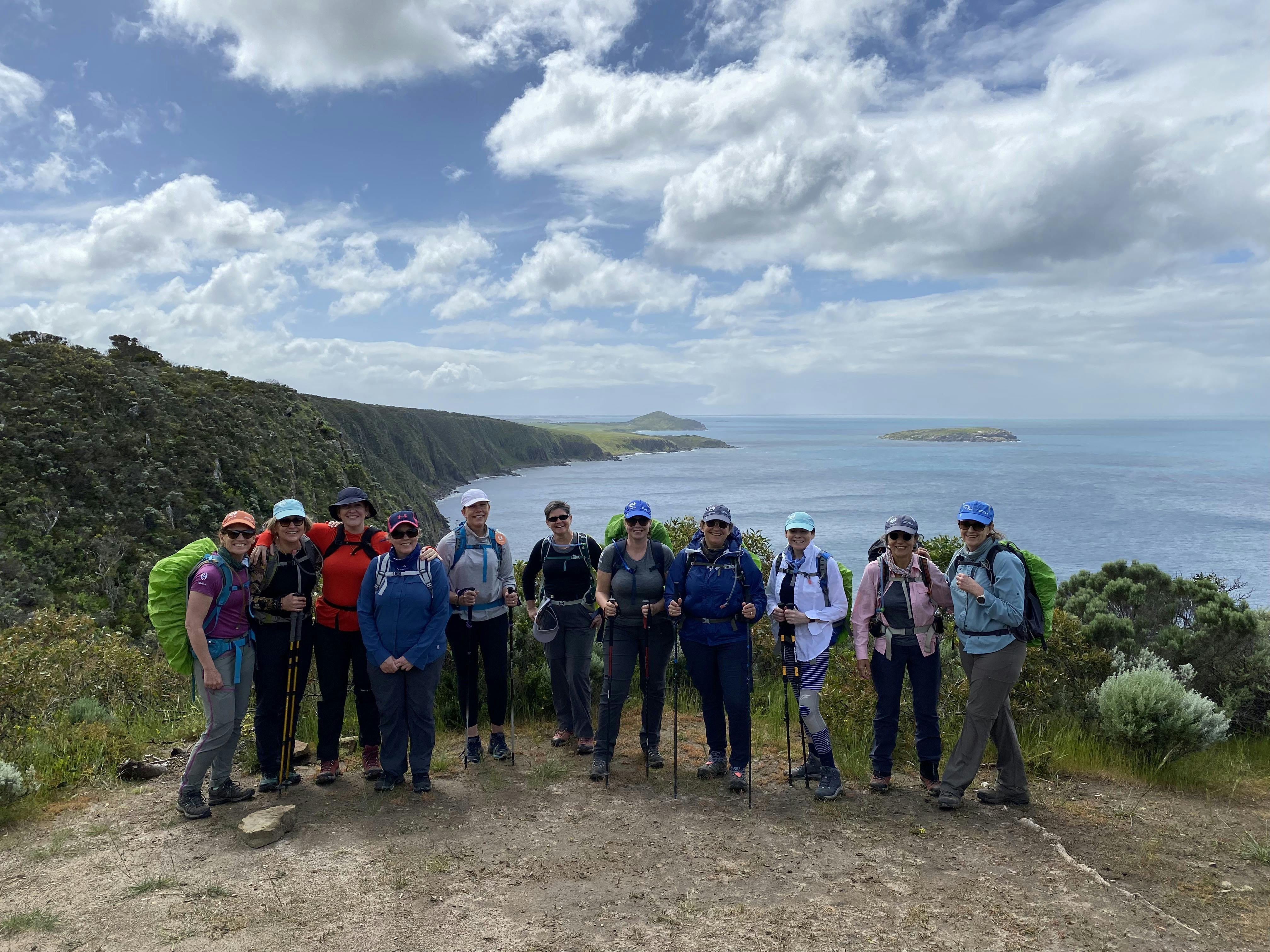 Group setting off on coastal trail in SA