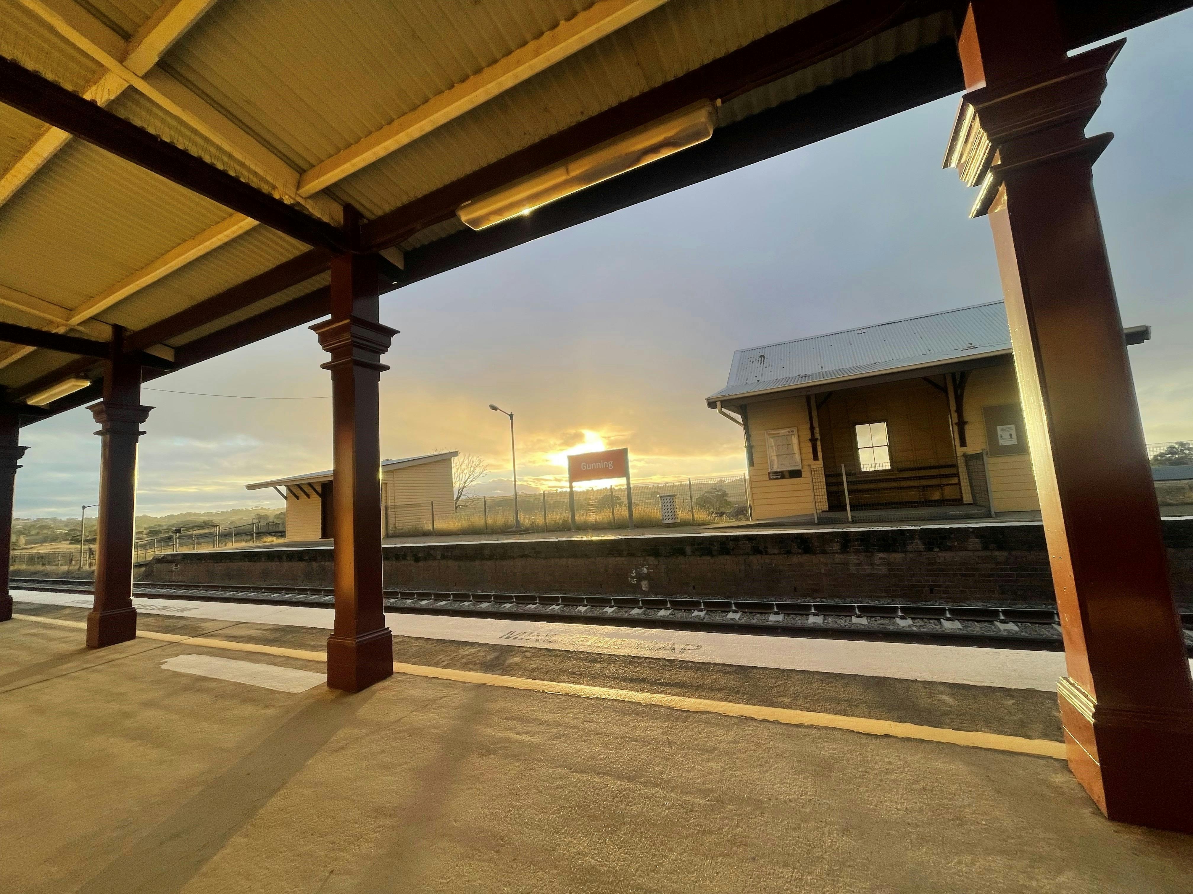 Standing on the platform at the golden hour watching the sun set.