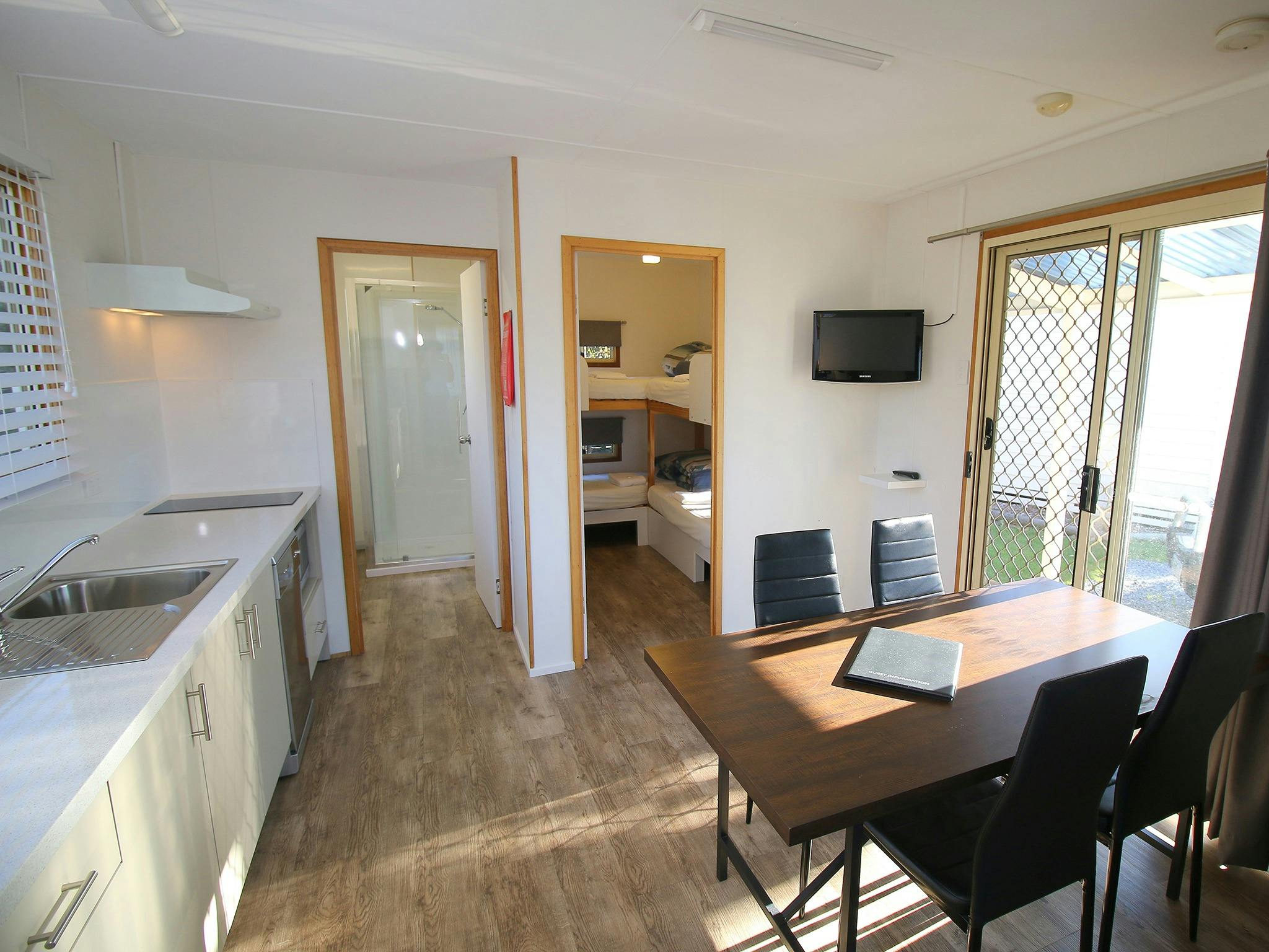 Family Cottage kitchen, dining, bathroom and bunk room