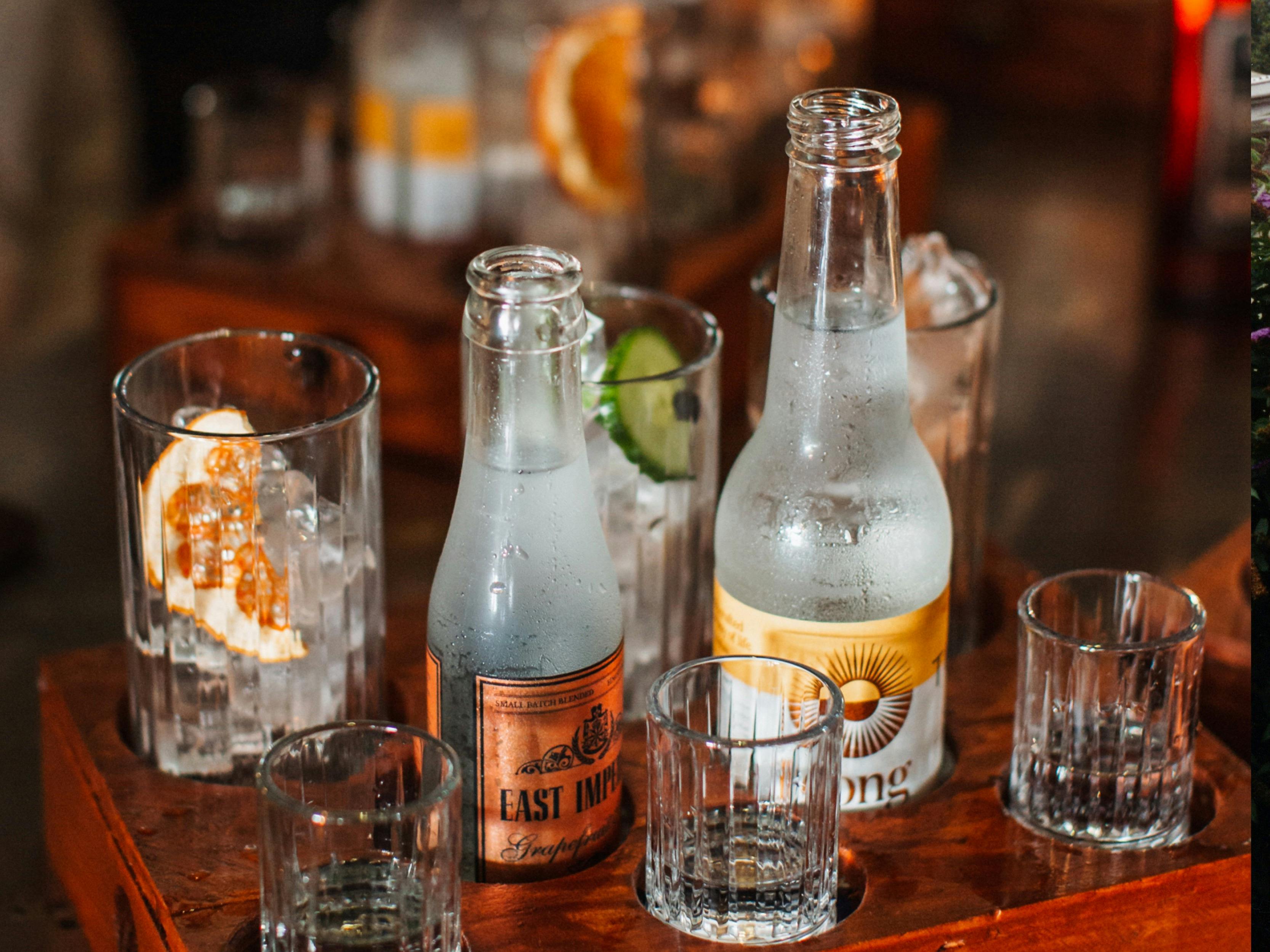 A photo of our gin tasting board featuring three gins and two tonics.