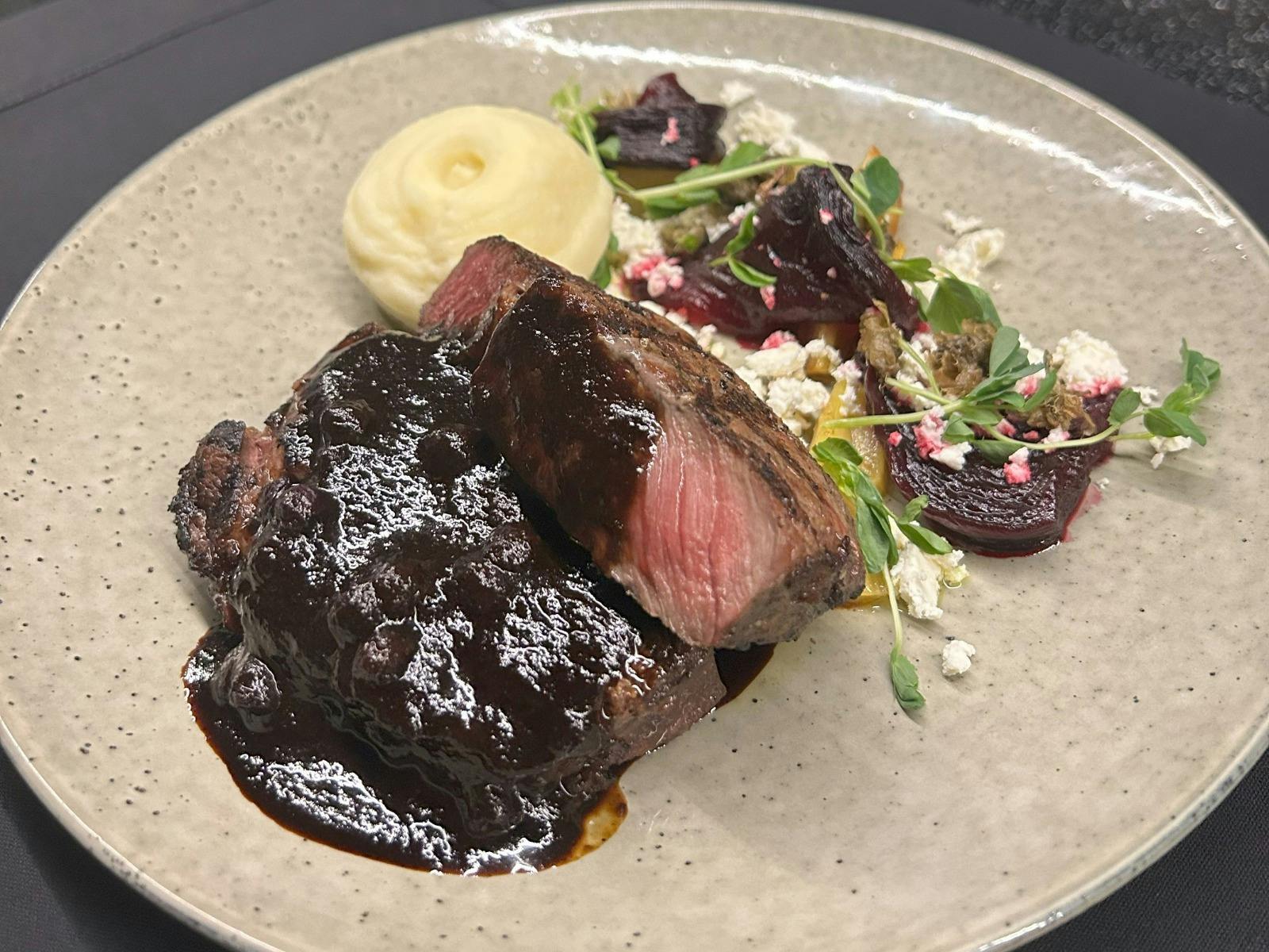 beef scotch with mash potato and side cress