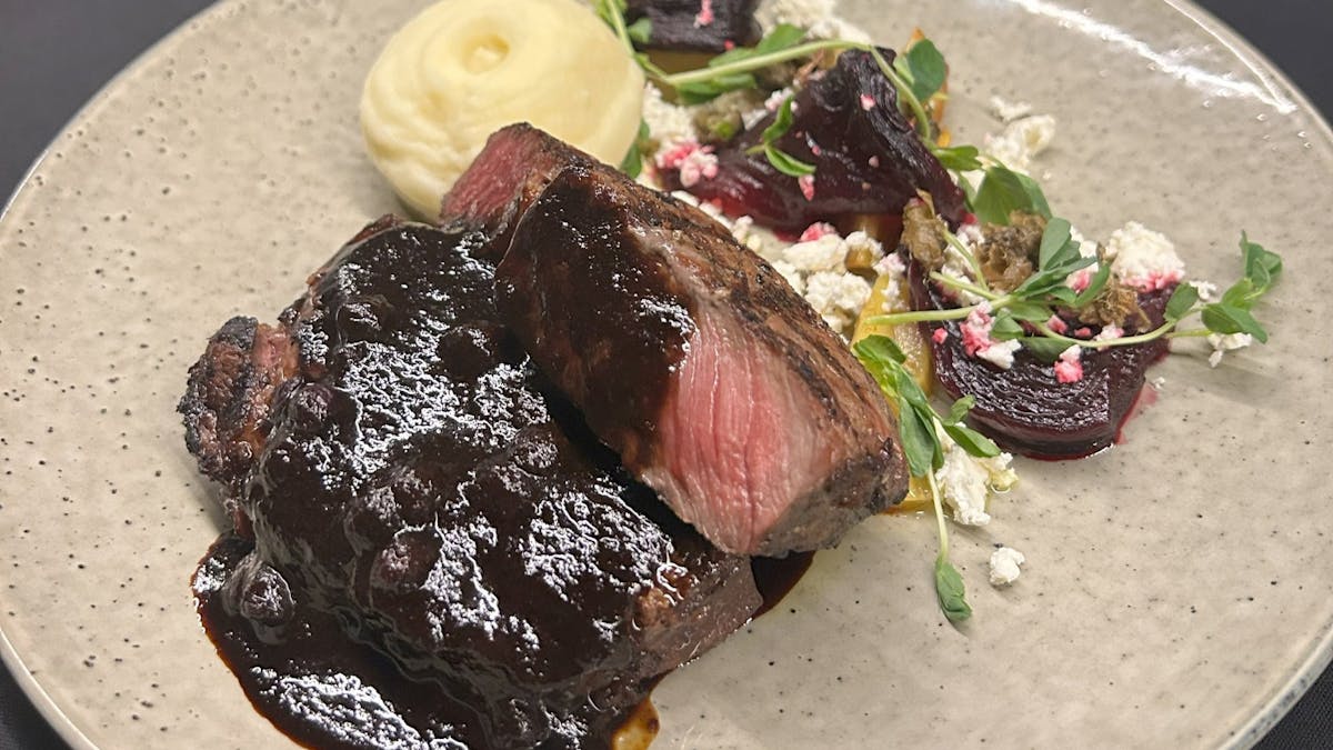 beef scotch with mash potato and side cress