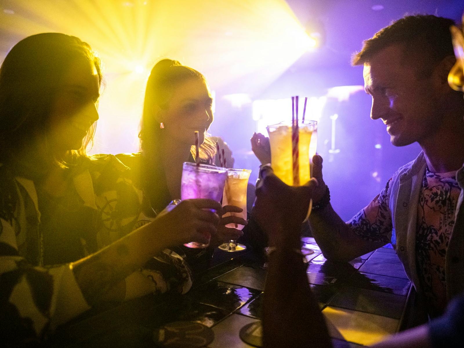 Friends enjoying drinks at Universal Sydney nightclub in Darlinghurst, Sydney