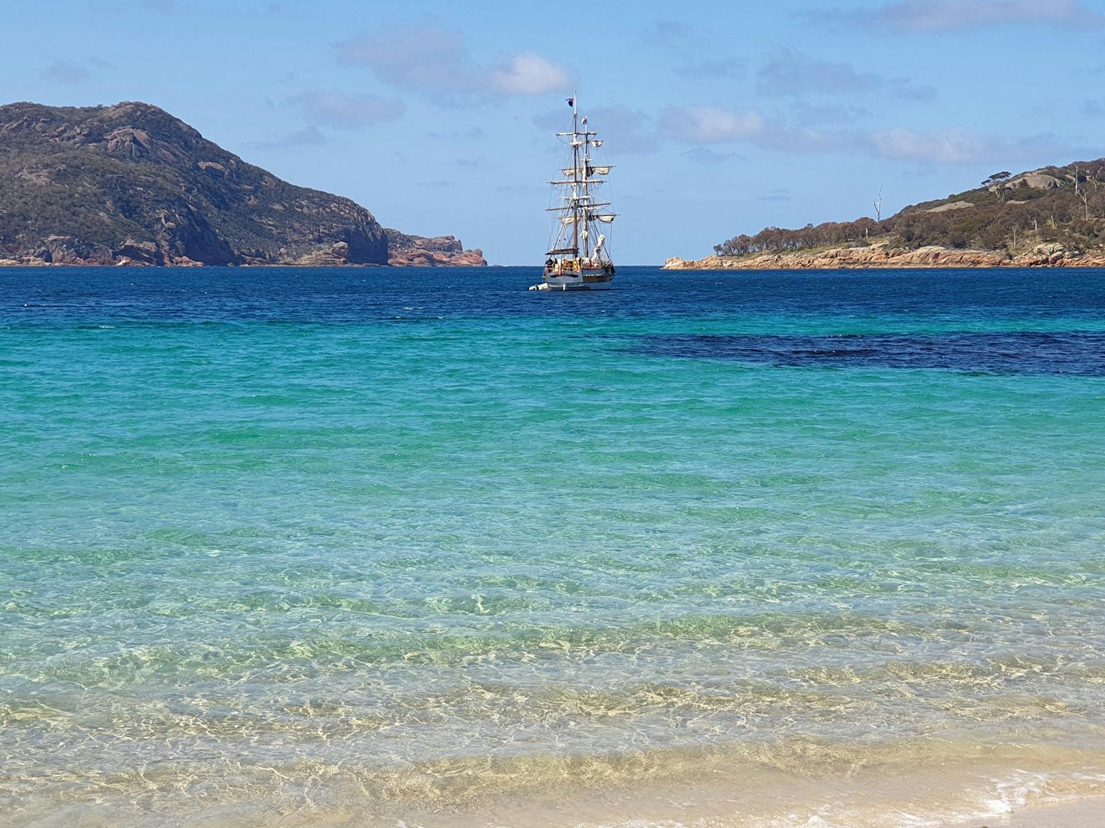 Lady Nelson at anchor in a stunning deserted bay on the East Coast of Tasmania
