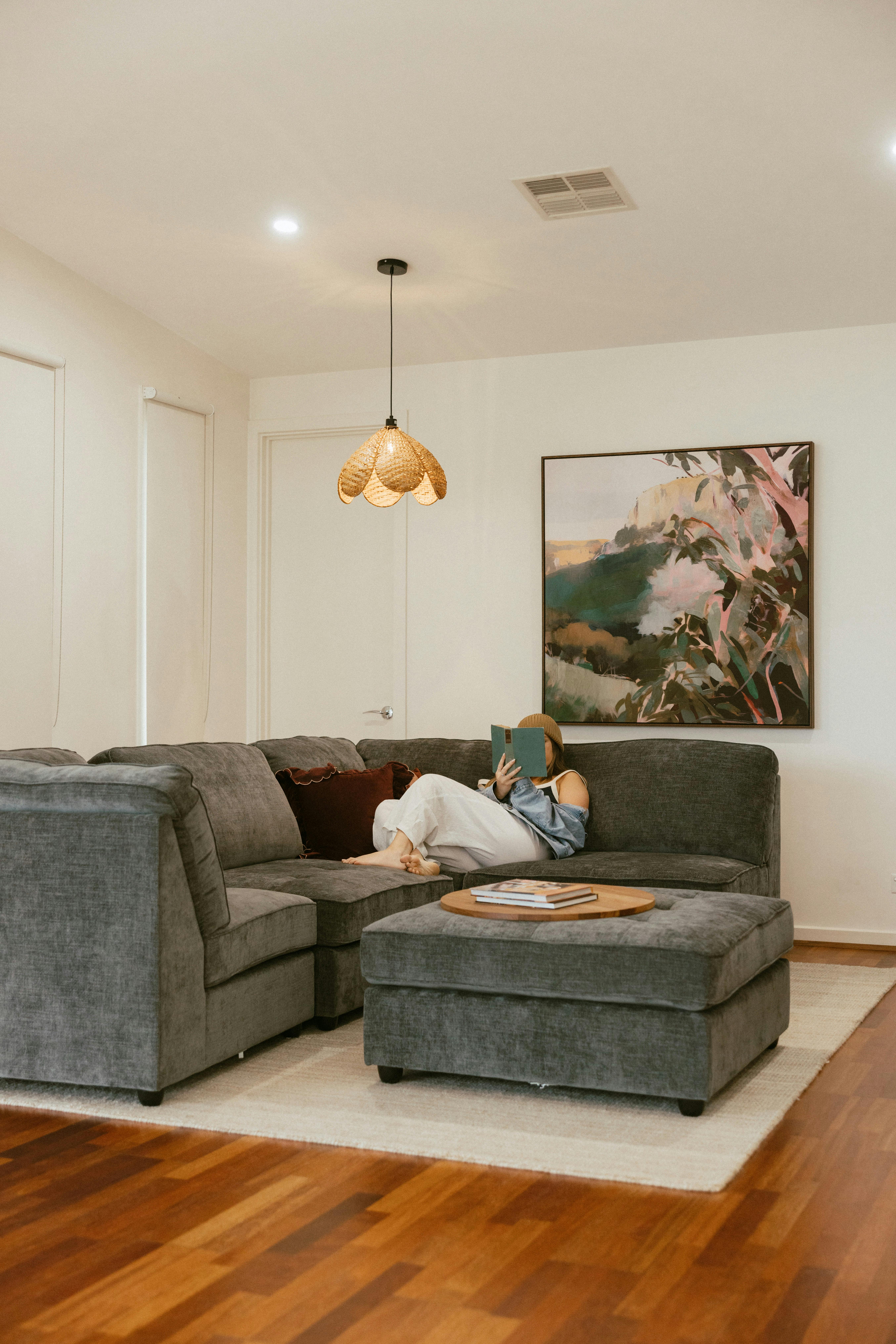 Comfy modular lounge and TV in the living room at Villa 1 by The Shores